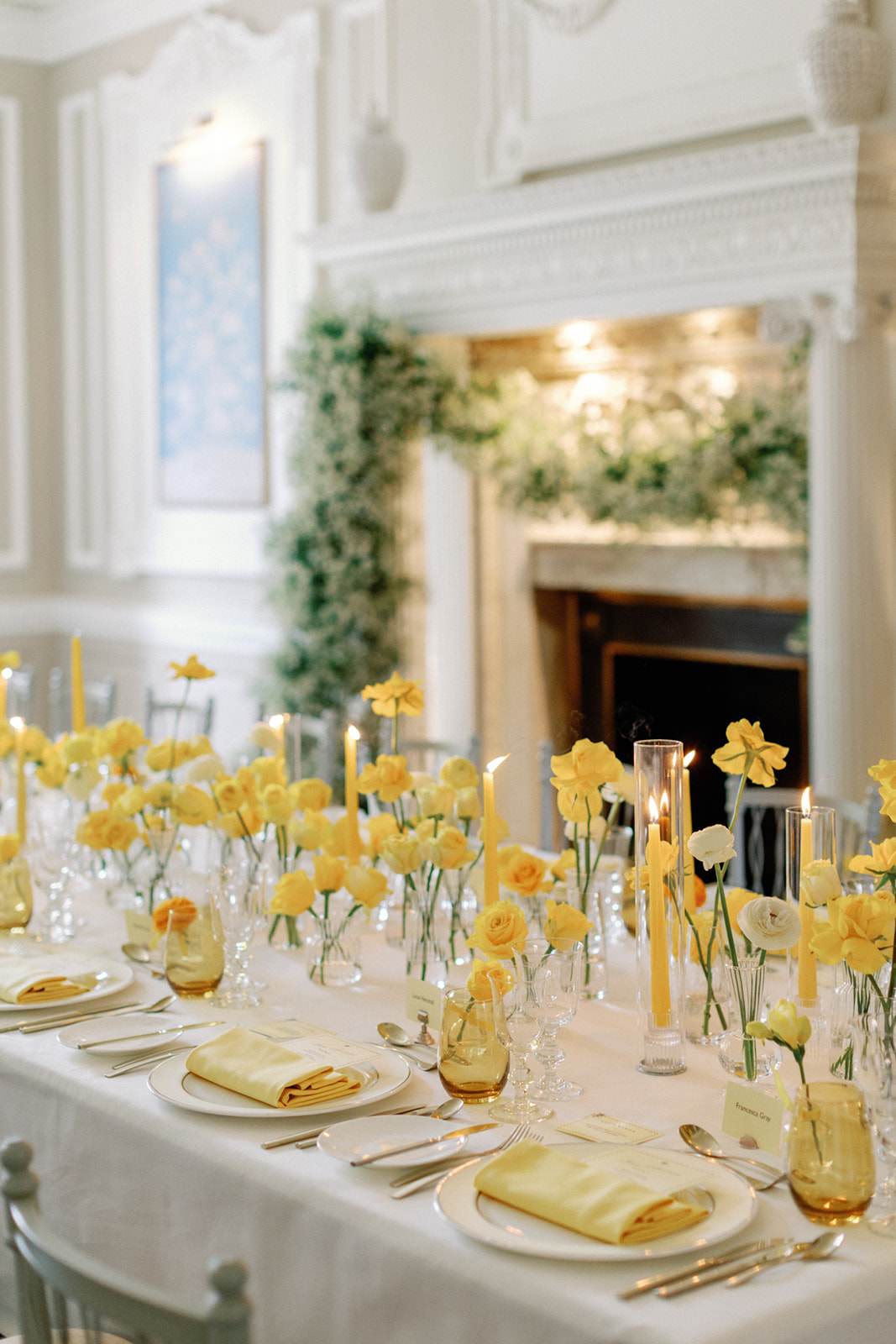 Brabourne Room event space with yellow floral centerpiece, ideal for weddings and gatherings.