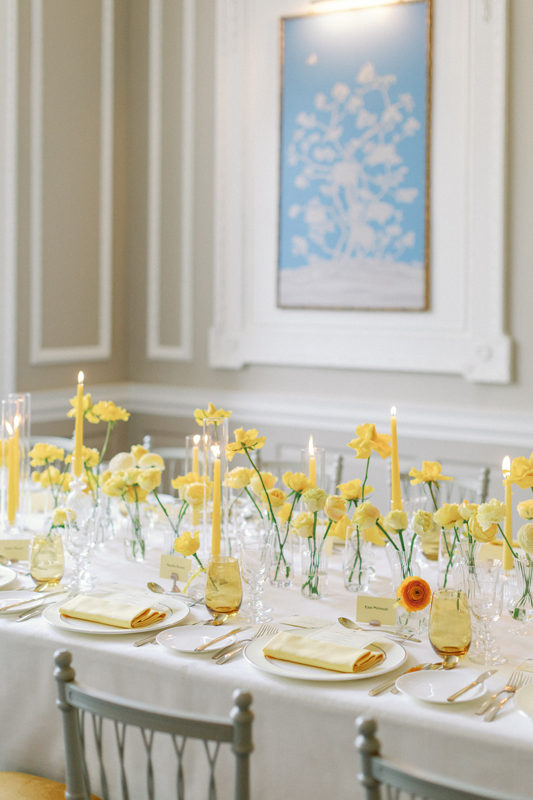 Elegant table setting with yellow flowers in Brabourne Room, perfect for sophisticated events.