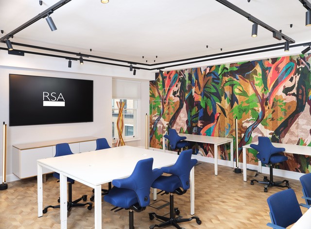Modern meeting space in RSA House with vibrant decor for workshops and brainstorming.