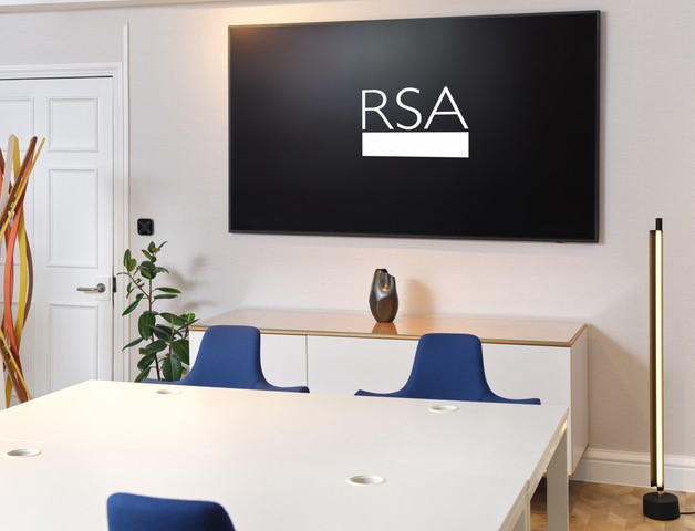 Modern meeting room in RSA House with sleek table, ideal for workshops and strategic discussions.