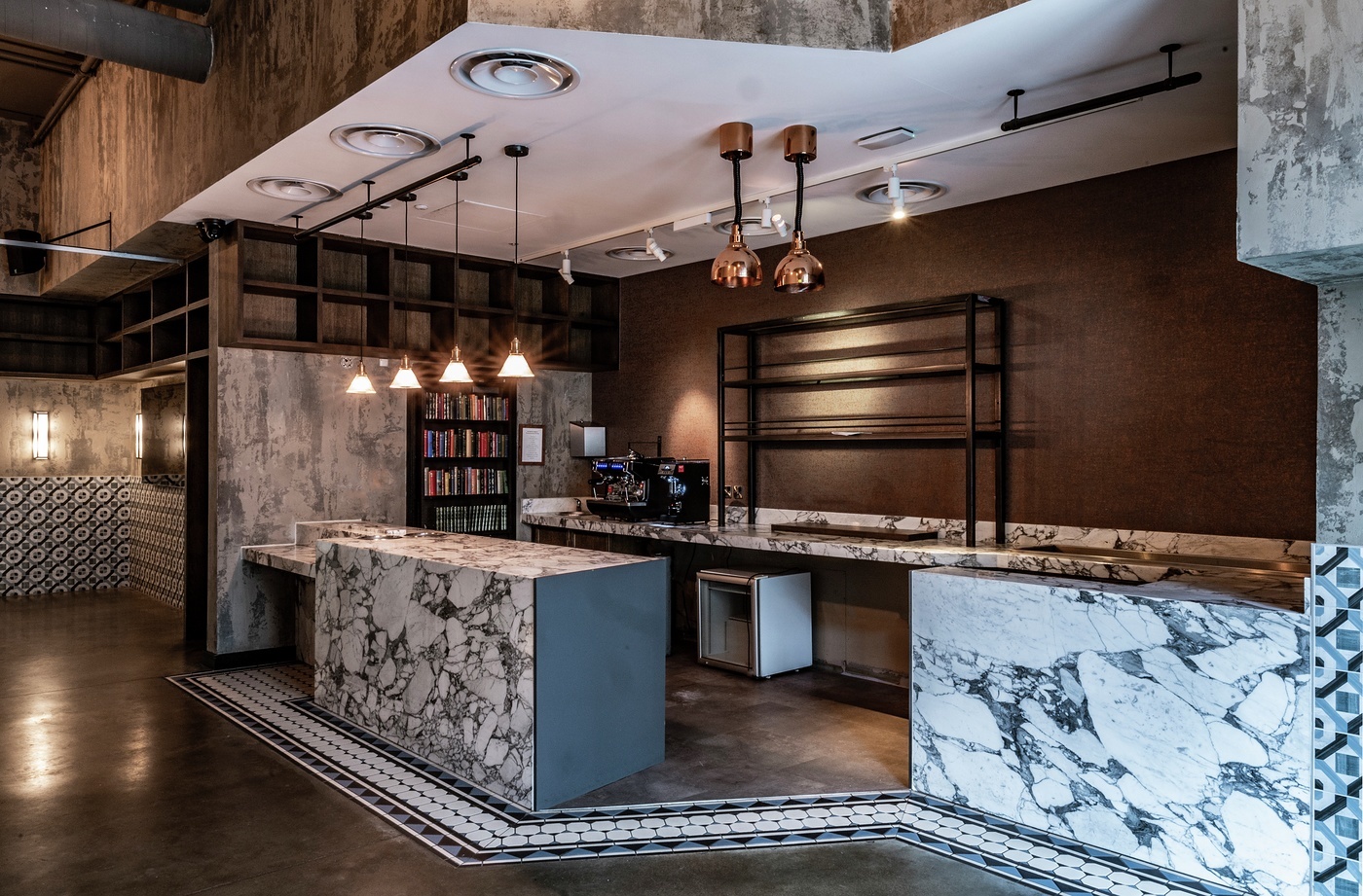 Private dining room at Bread Street Kitchen with sleek marble countertops, ideal for events.