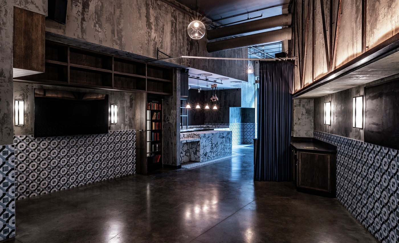 Private dining room at Bread Street Kitchen, featuring industrial-chic design for events.