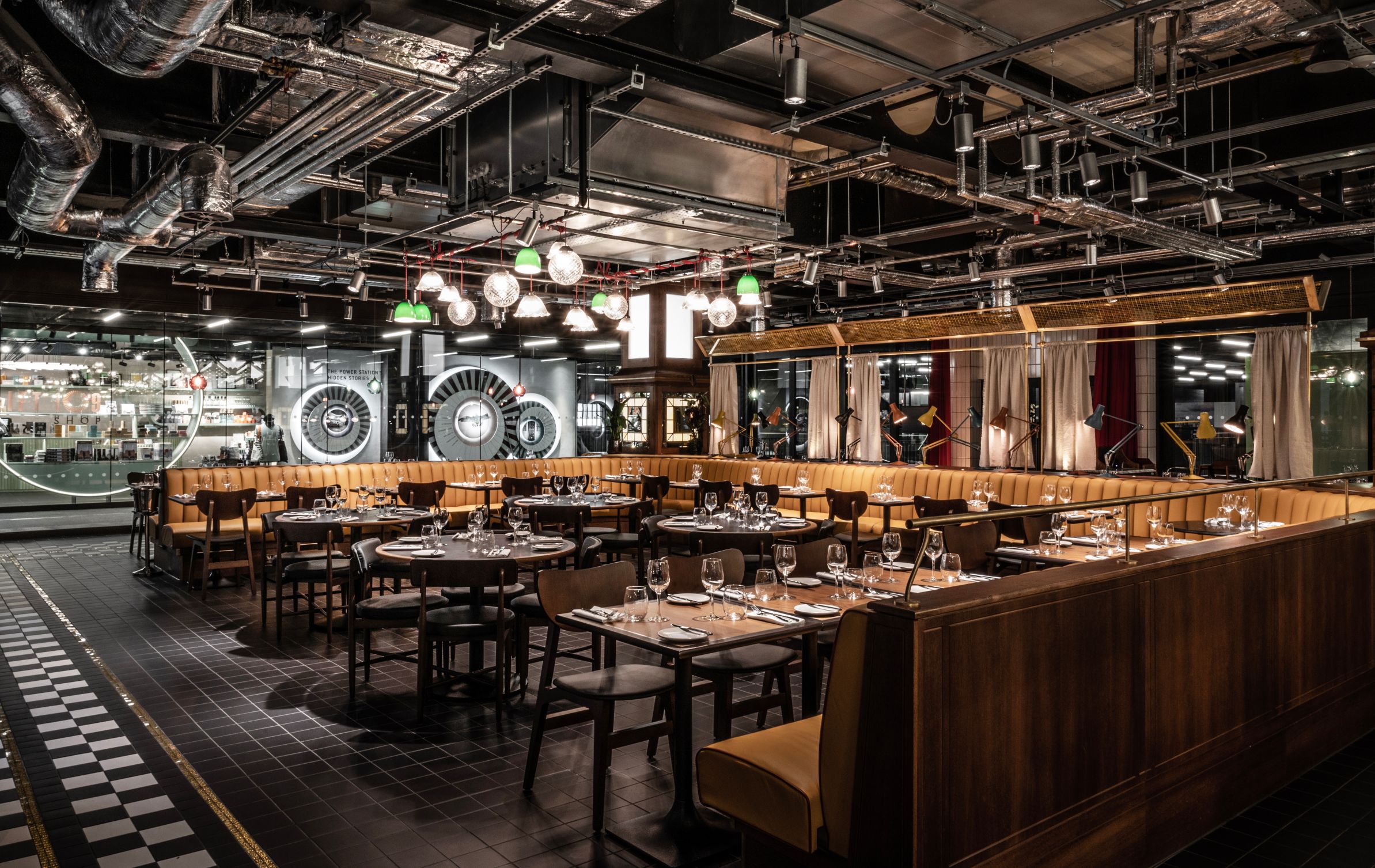Modern restaurant venue with industrial decor for corporate events and private dinners.