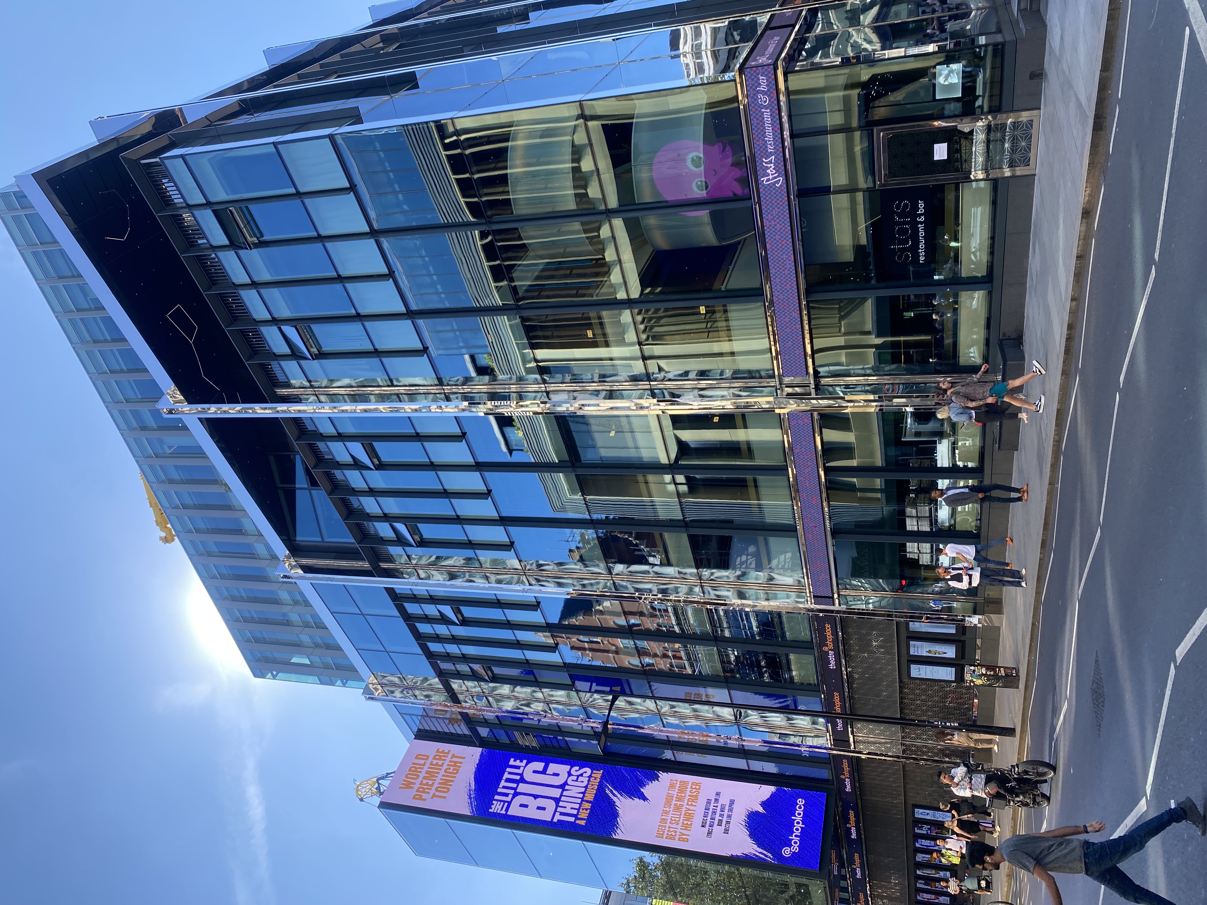 Sohoplace auditorium, modern glass facade, ideal for events and conferences.