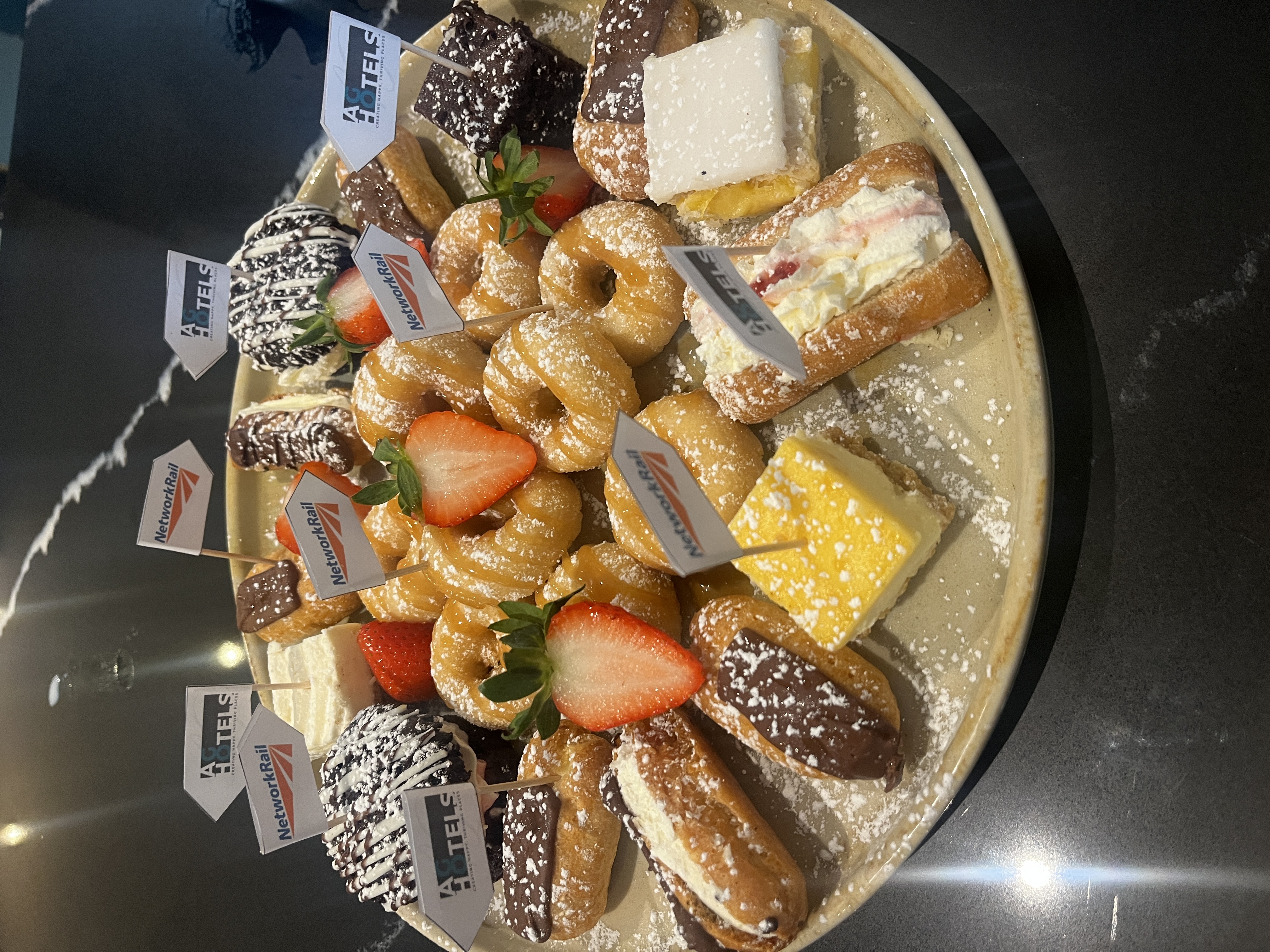 Dessert platter with pastries for networking event at The Stuart Hotel meeting room.