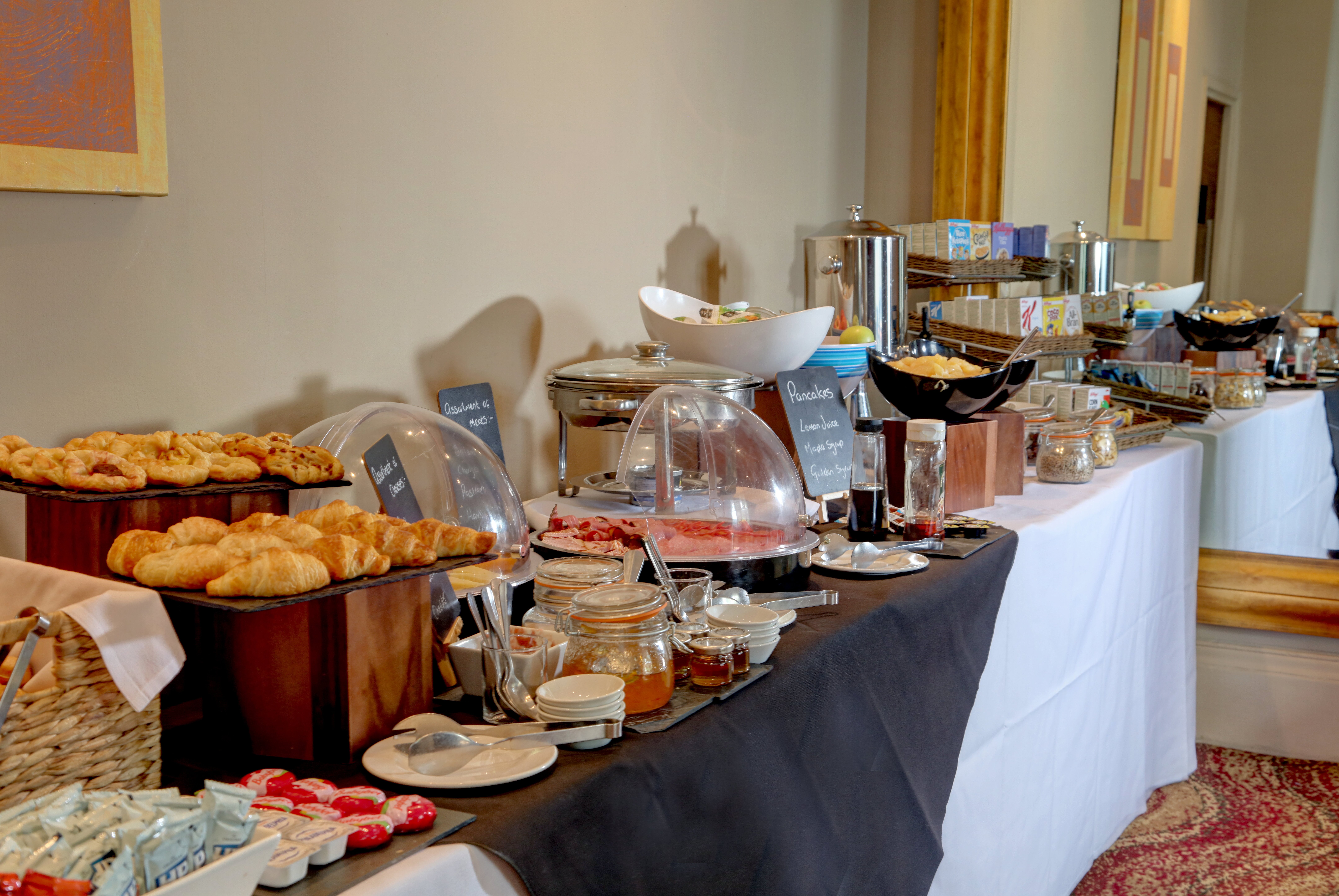 Buffet setup in The Stuart Hotel meeting room for professional events and catering.
