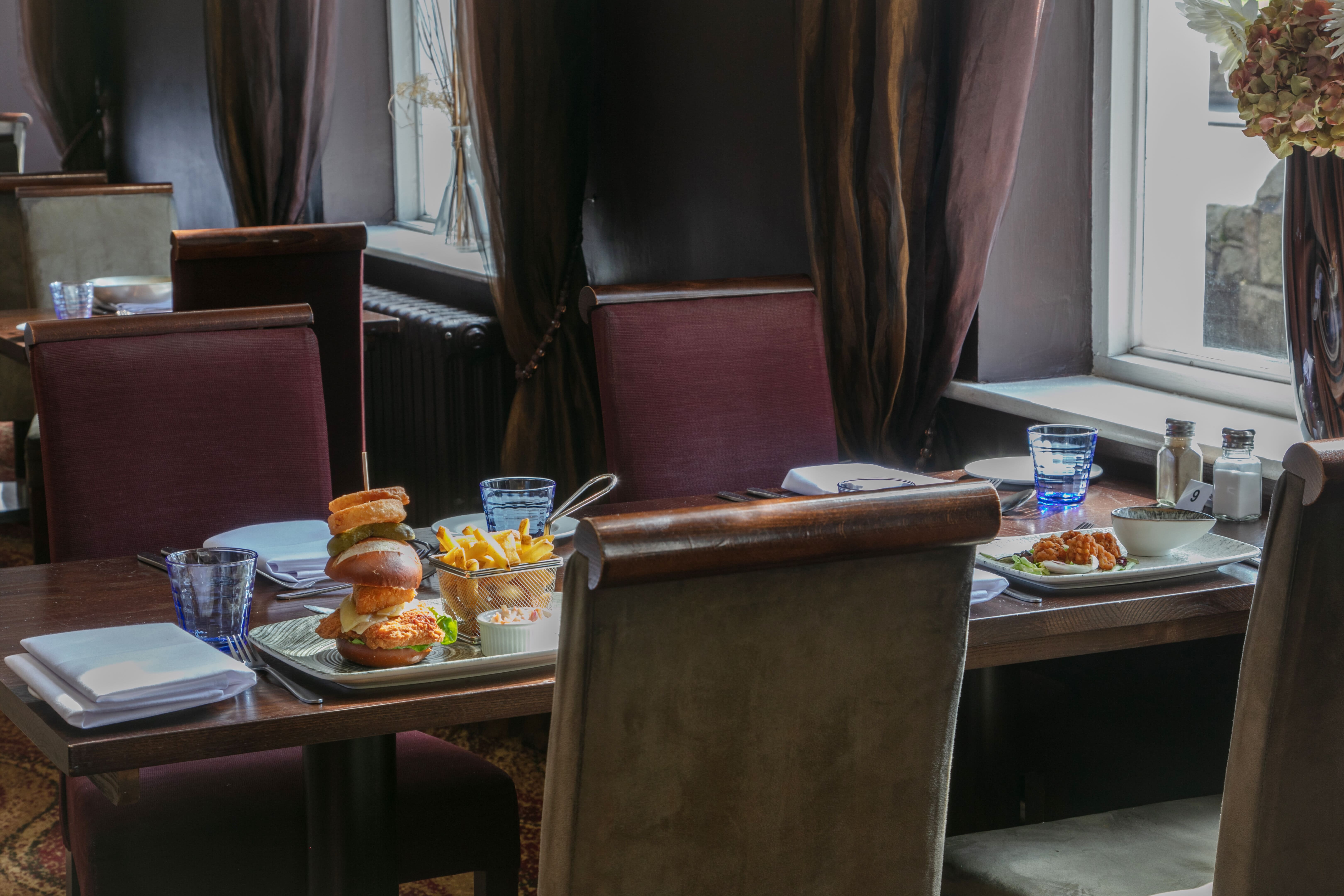 Meeting Room at The Stuart Hotel with elegant dining setup for events and meetings.