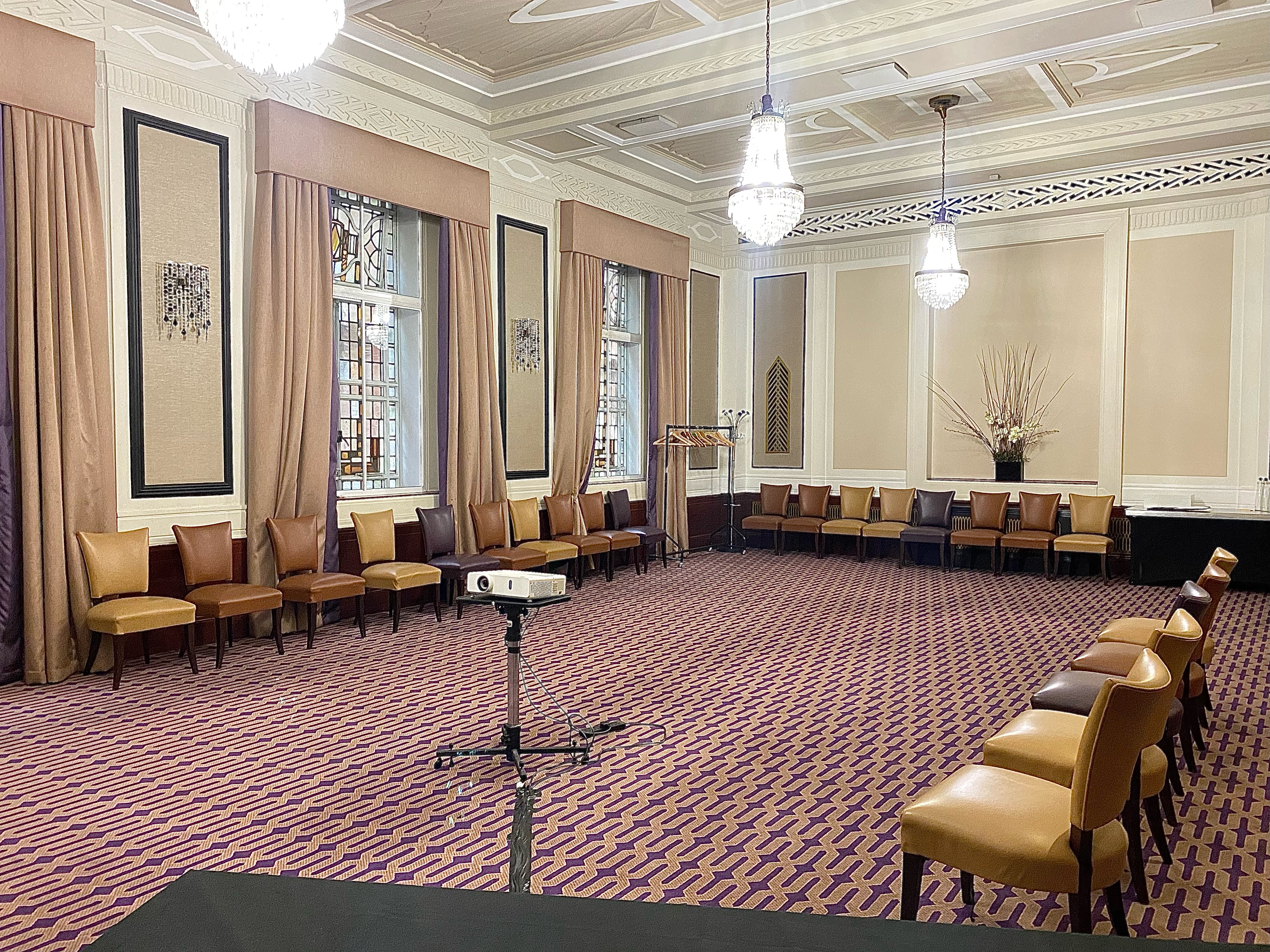 Private dining suite with elegant decor, ideal for professional meetings and workshops.