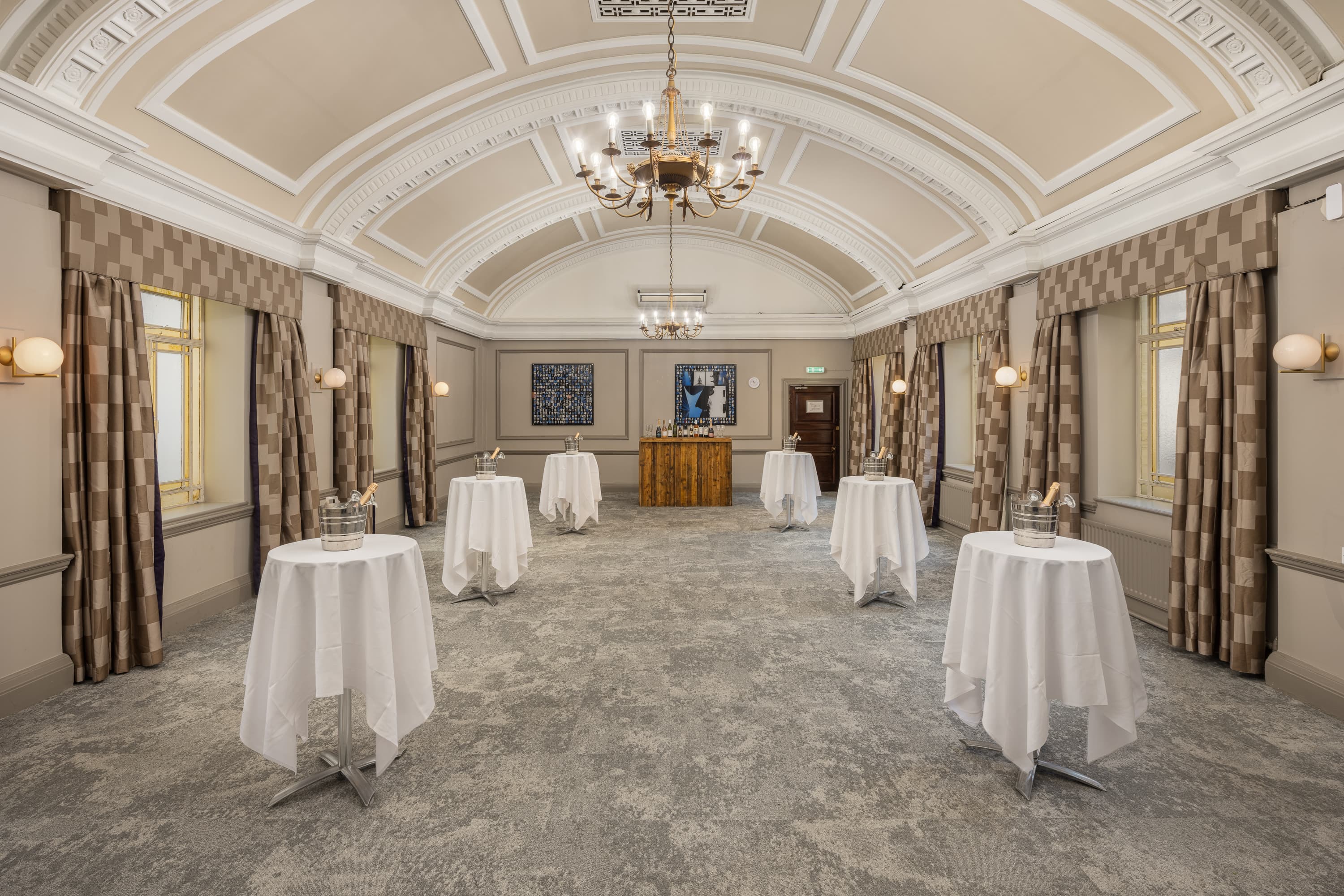 Ampthill Suite cocktail reception room with vaulted ceilings, ideal for elegant corporate events.