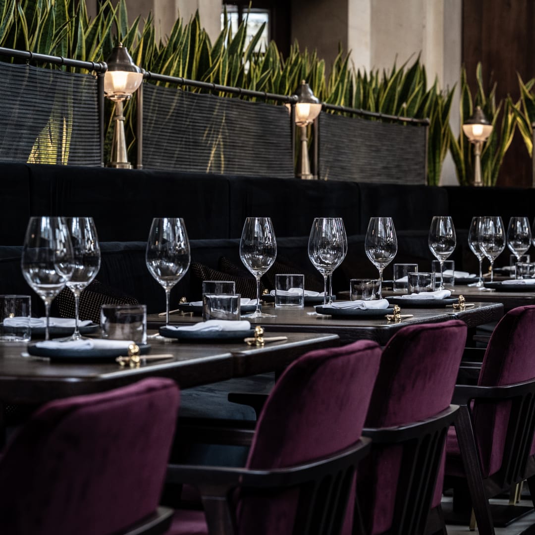 Exclusive hire dining setup at Lucky Cat, Manchester - elegant glassware for upscale events.
