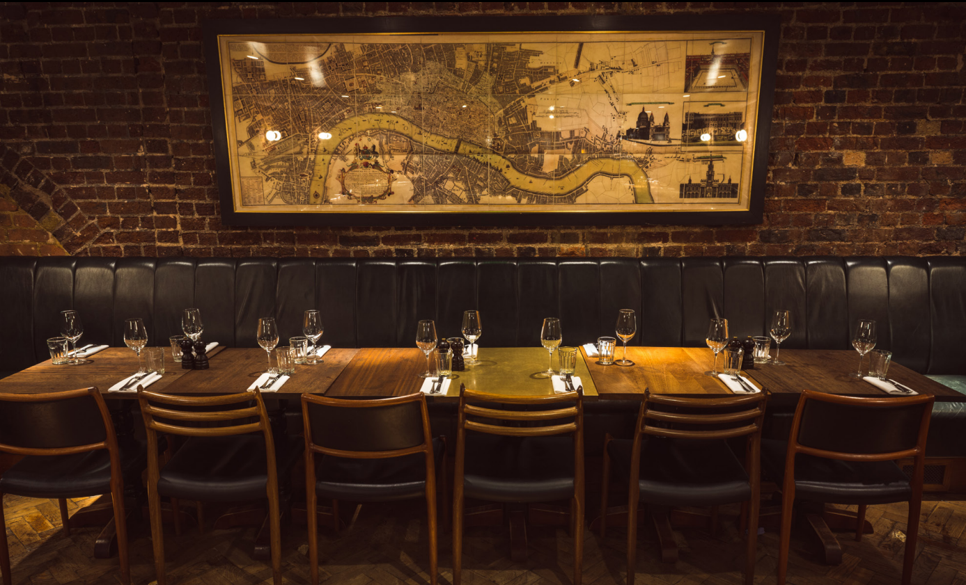 Stylish dining setup at Hawksmoor Spitalfields for corporate dinners and events.