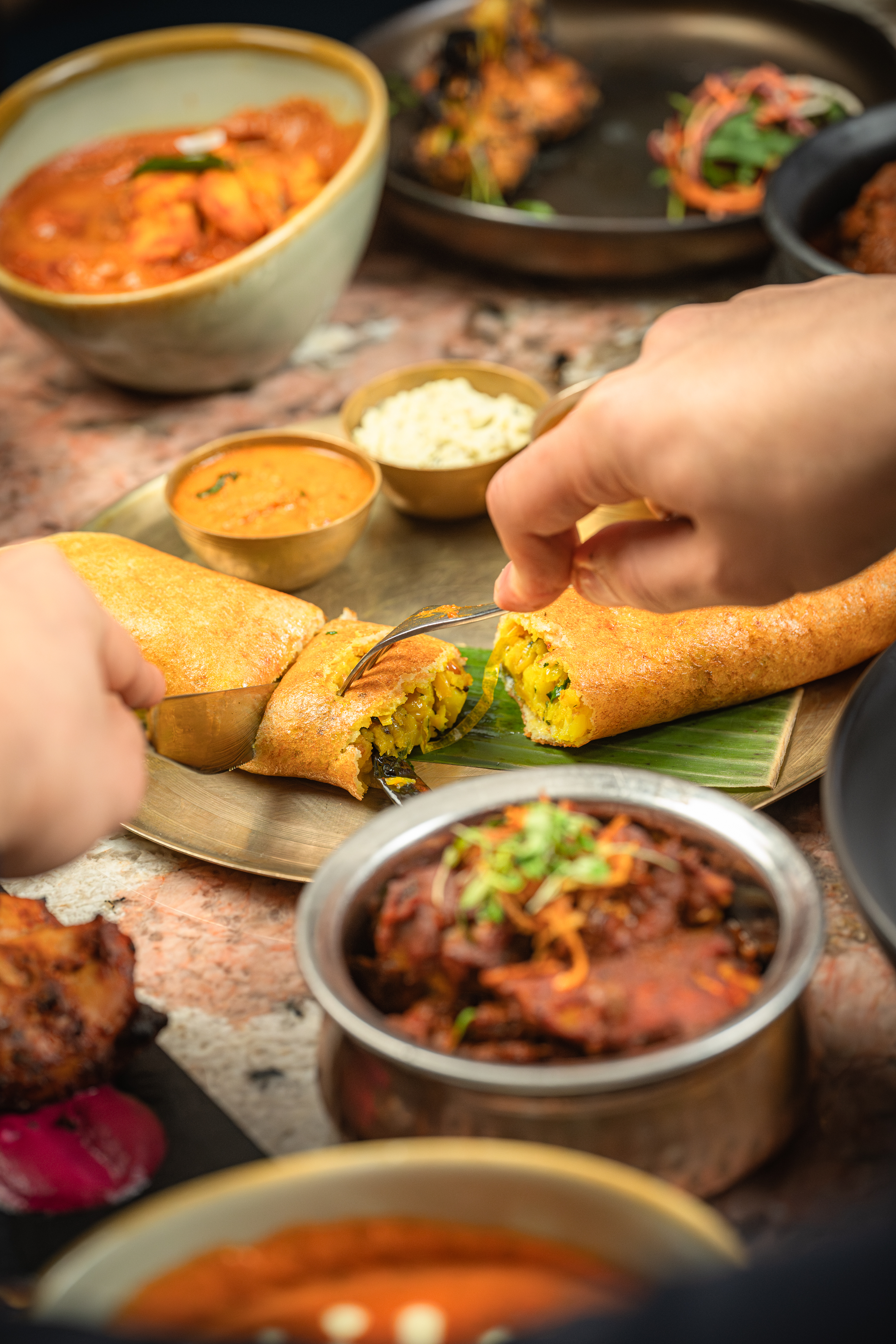 Plate of dosas at Bombay Delight, perfect for catering events and memorable gatherings.