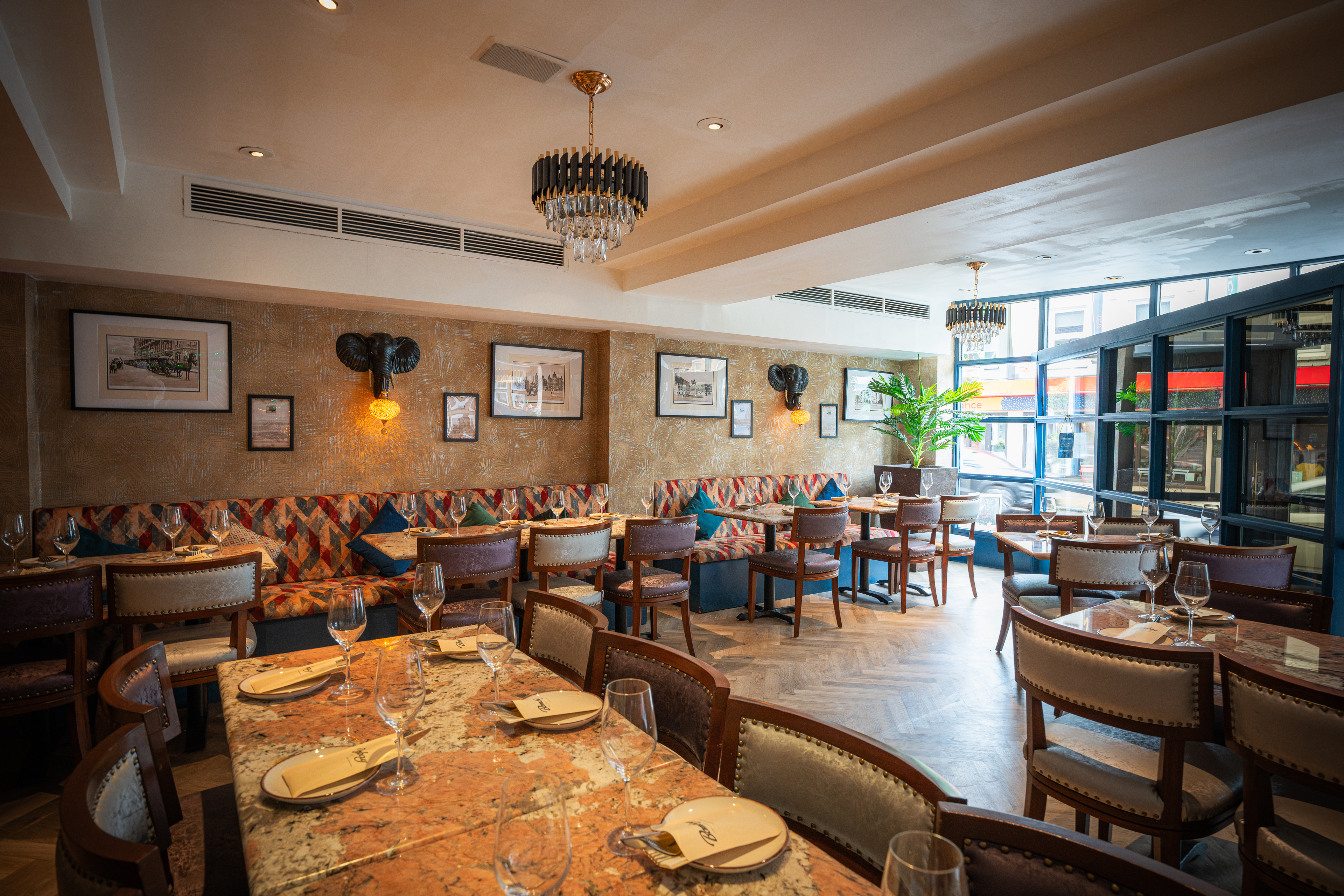 Elegant restaurant interior with plush seating for intimate gatherings and corporate events.