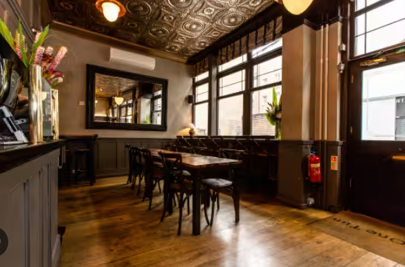 Chloë's Basement Bar: stylish venue with wooden floors for events and casual dining.