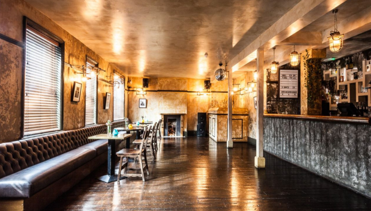 Intimate venue with rustic decor for small meetings and events in Peckham.
