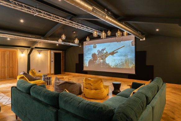 Modern meeting space with cozy seating for creative brainstorming at Tewin Bury Farm.