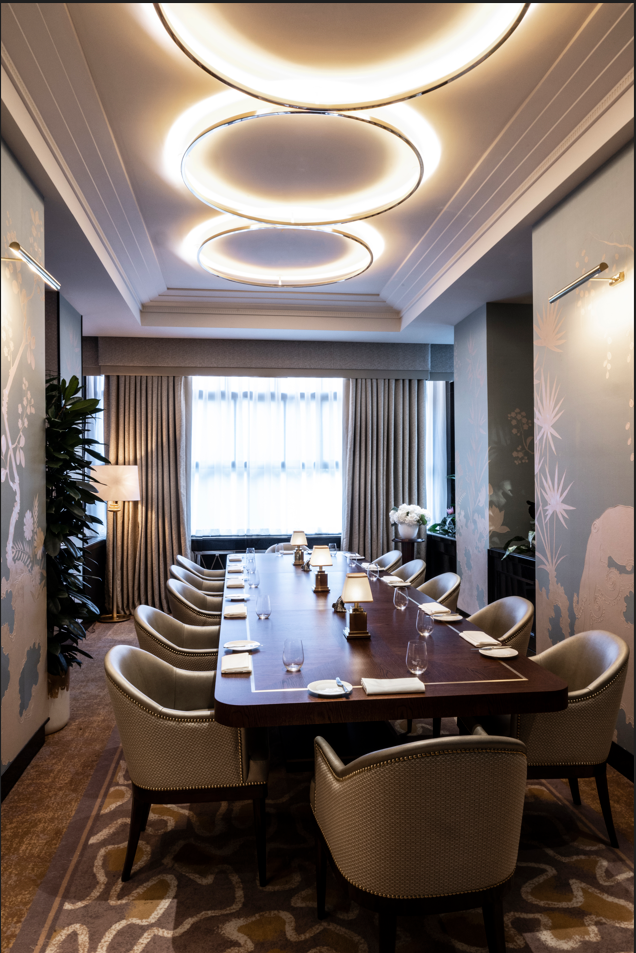 Private meeting room at The River Restaurant, elegant table setting for corporate events.