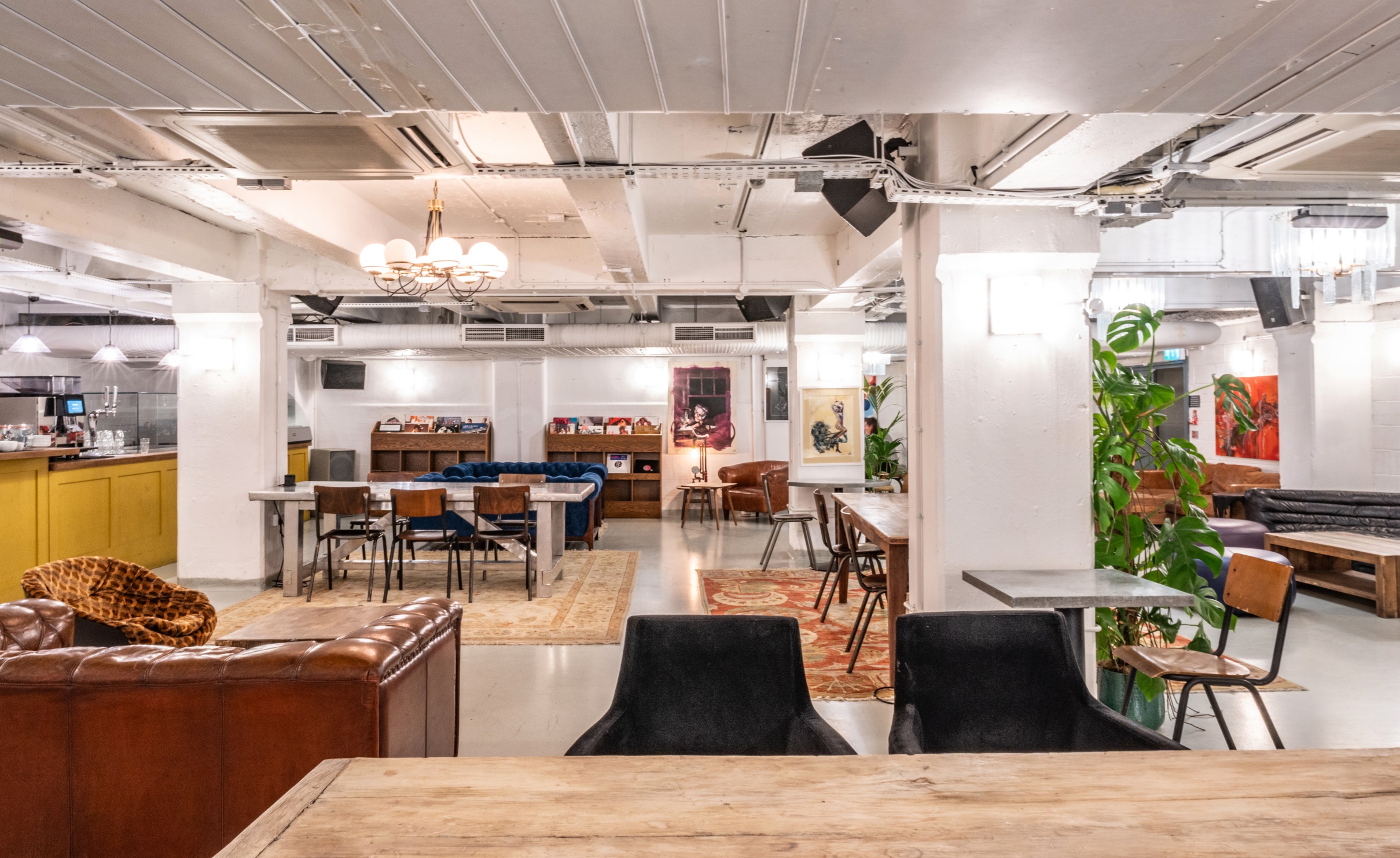 Versatile event space at Pizza East with modern decor for meetings and gatherings.