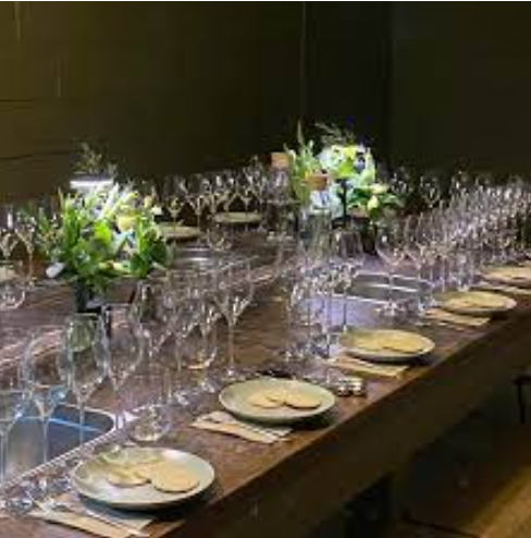 Elegant dining setup at Brityard bar with polished glassware for formal events.