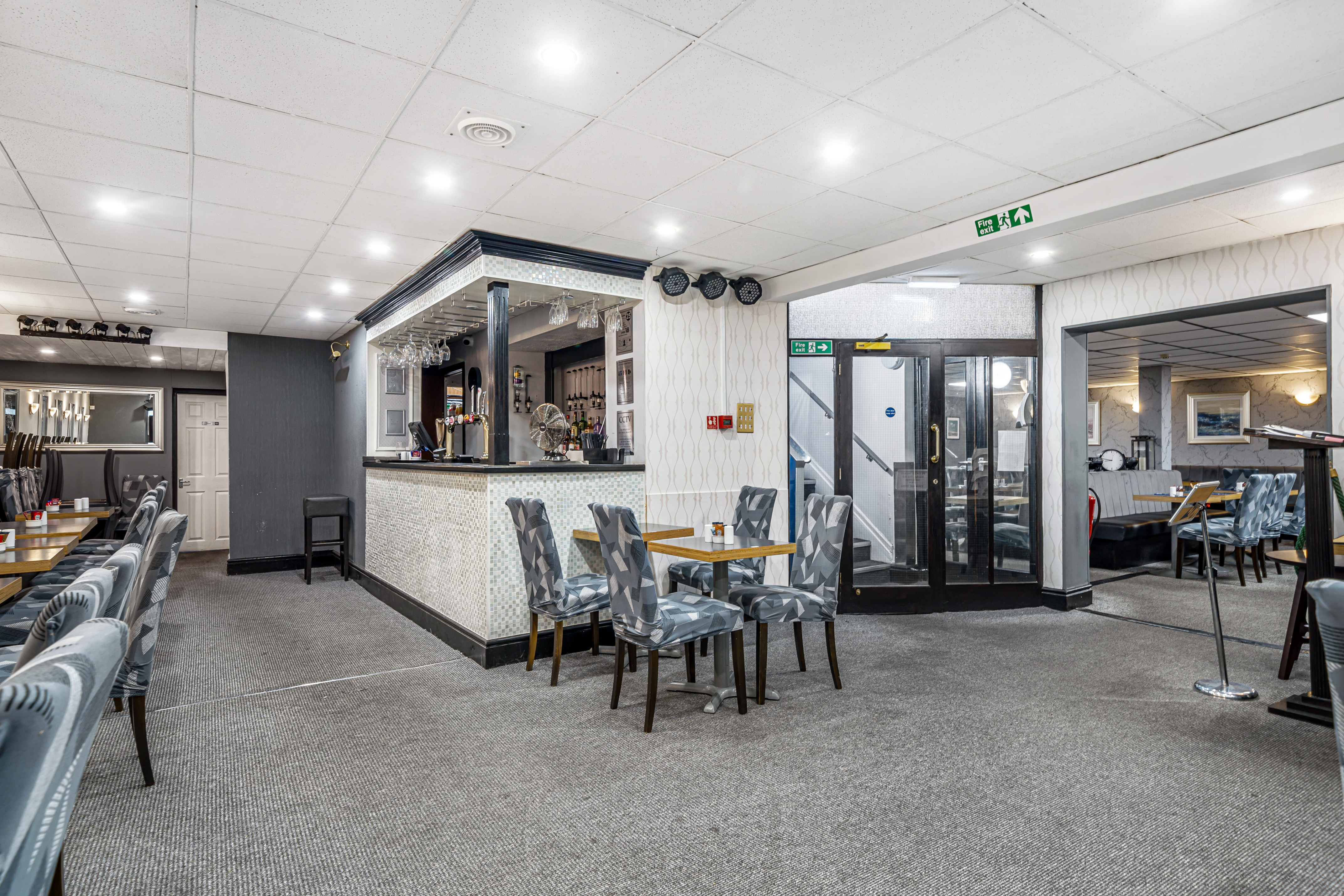 Modern meeting room at Bluewaters Hotel with flexible seating for events and gatherings.