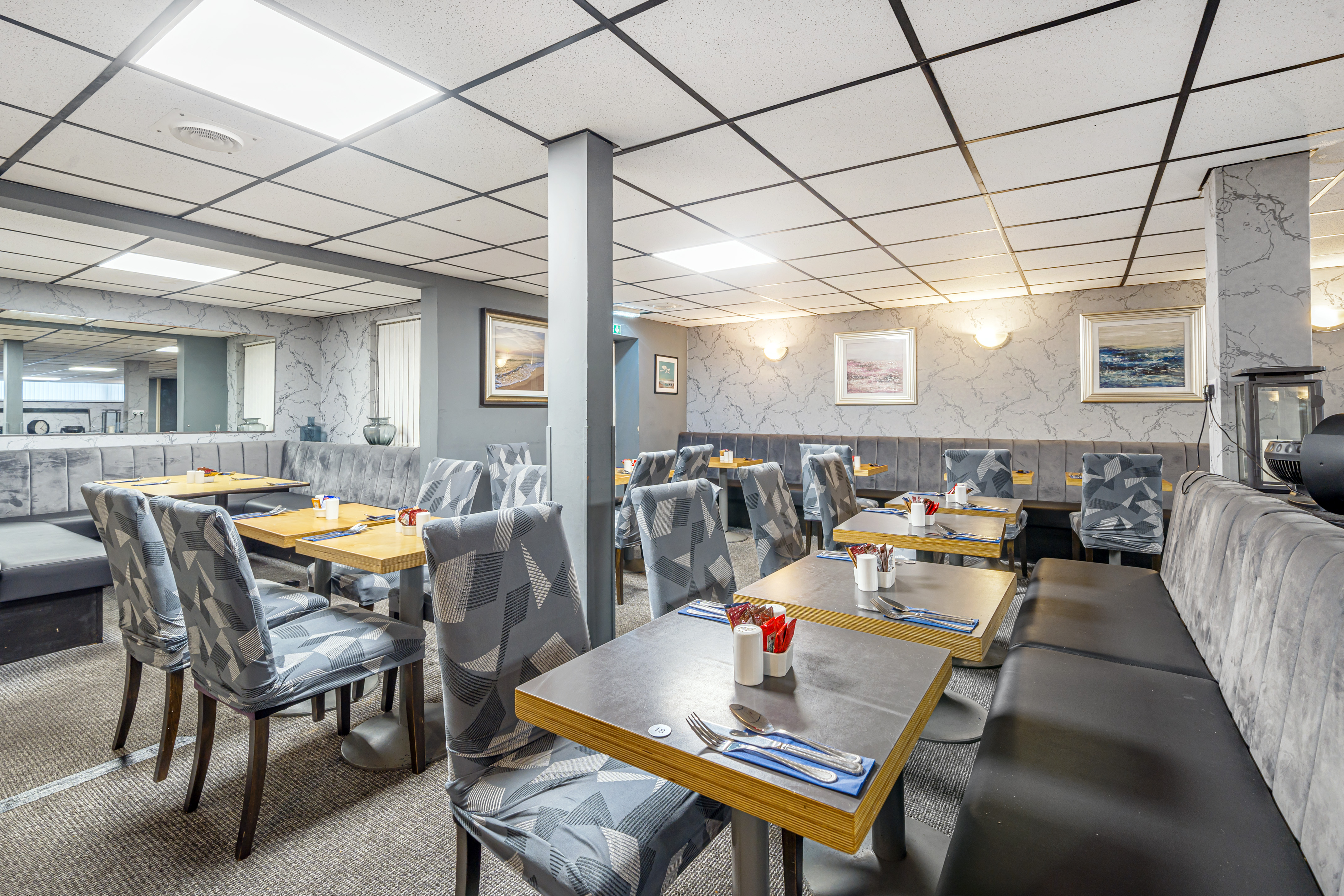 Meeting Room 1 at Bluewaters Hotel, modern seating for intimate meetings and events.