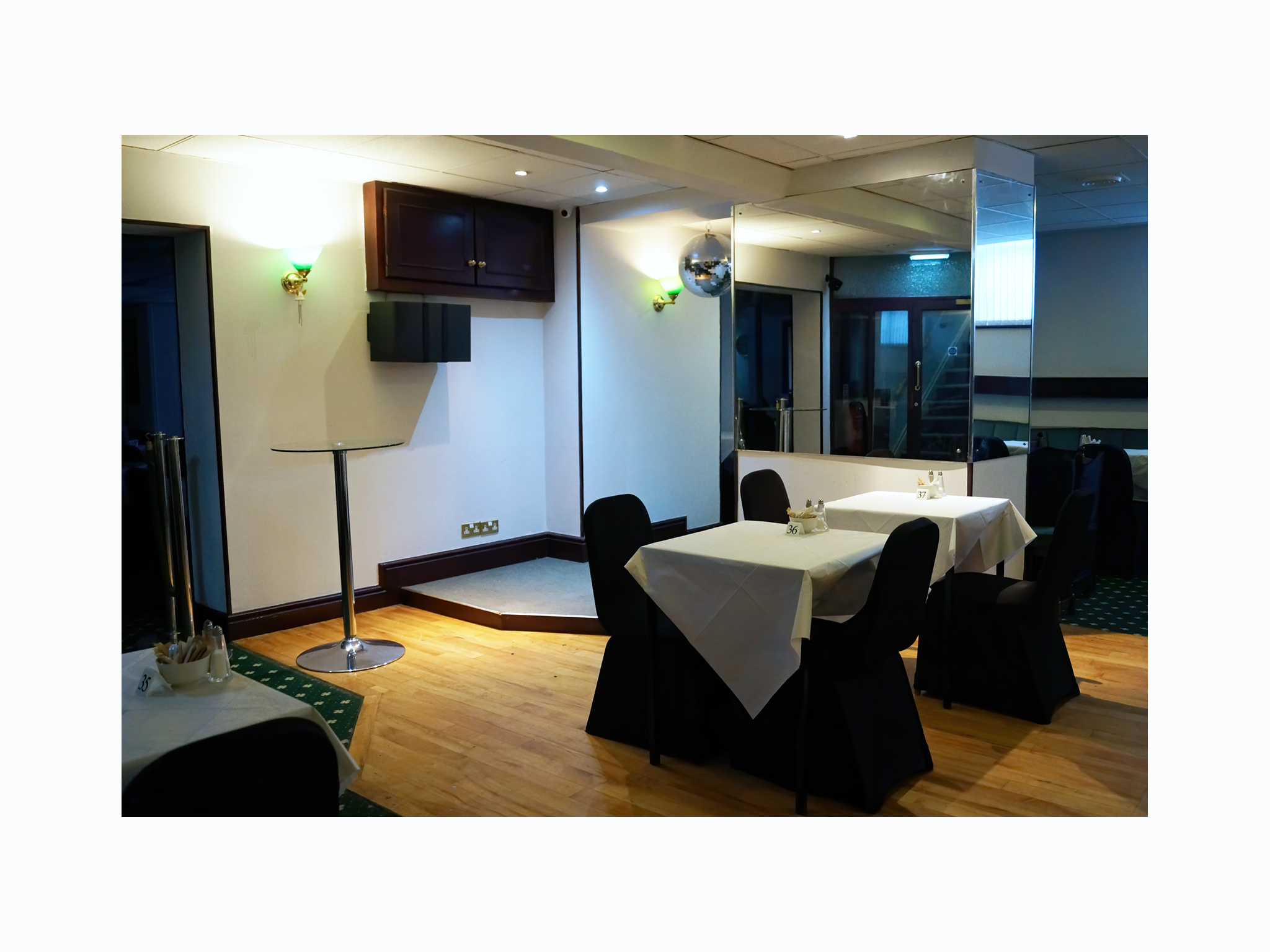 Meeting Room 1 at Bluewaters Hotel, featuring elegant tables for meetings and events.