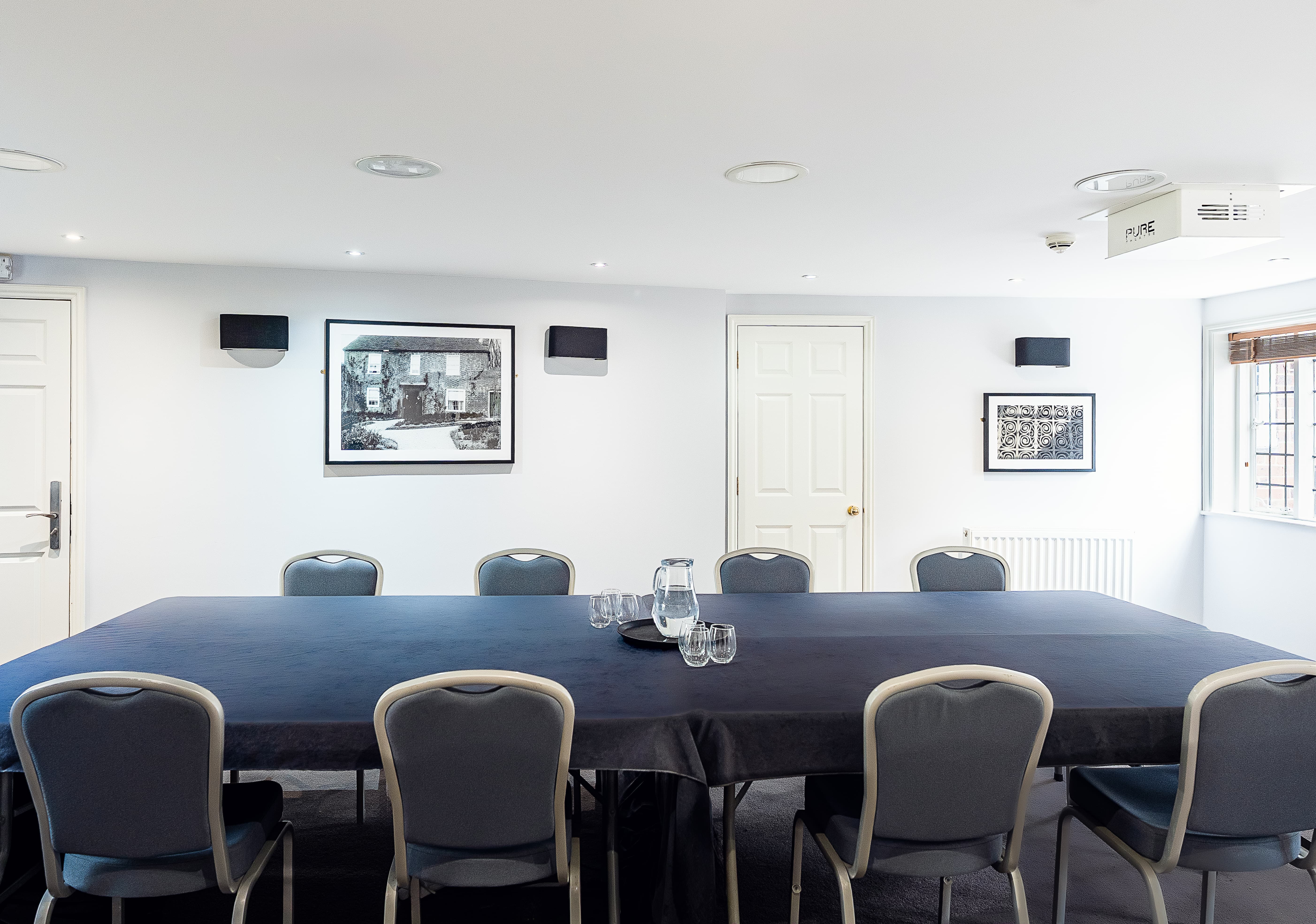 Boardroom at Leeds Castle: functional meeting space for corporate events and professional hire.