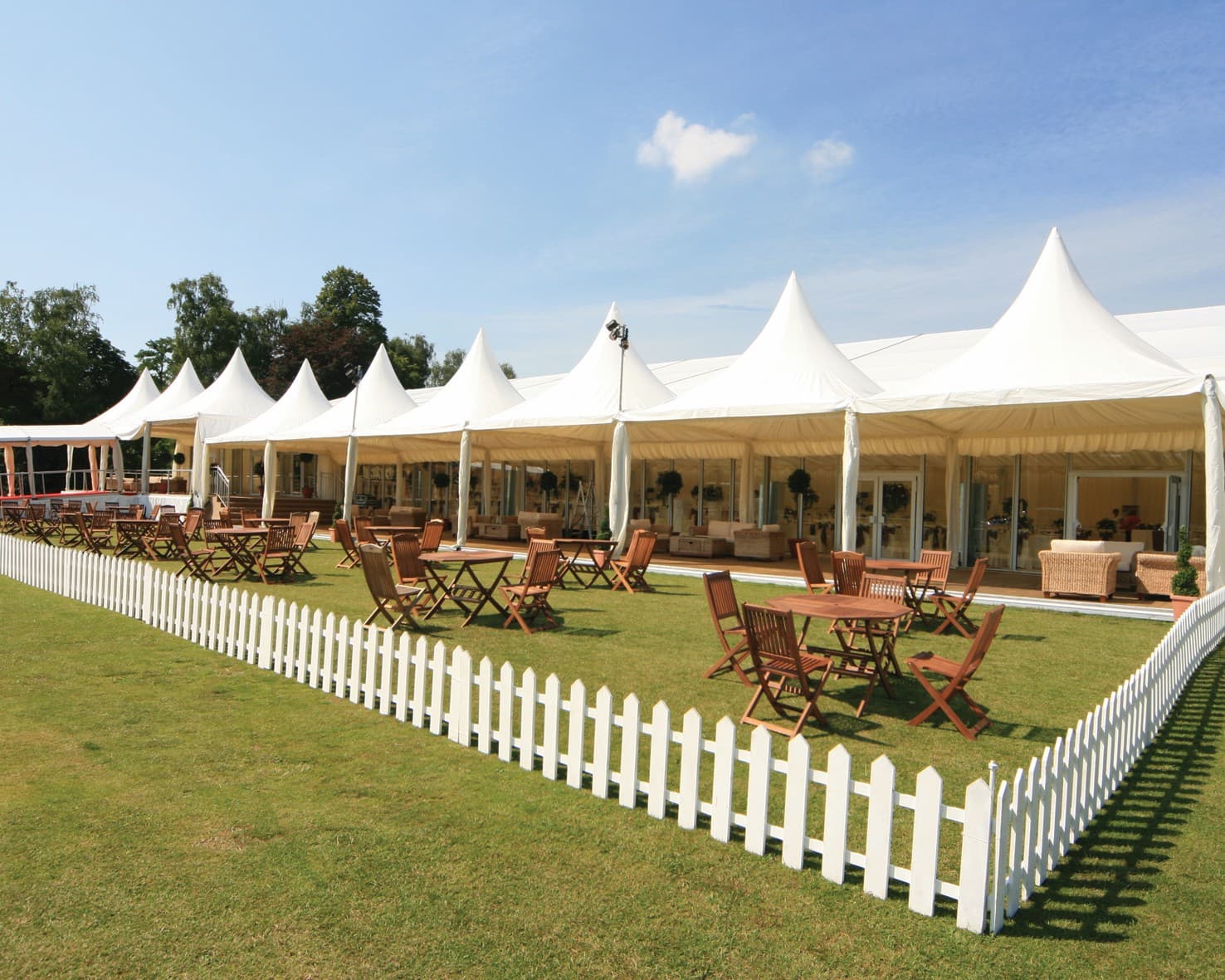 Luxury high-peak marquee at Leeds Castle for corporate hospitality and event hire.