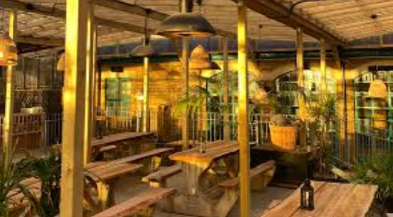 Vibrant outdoor venue at The Pub in Pacific Tavern for casual meetings and events.