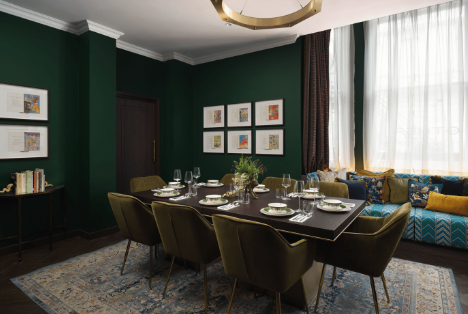 Mervyn Peake in The Other House: elegant meeting space with rich green walls for upscale events.