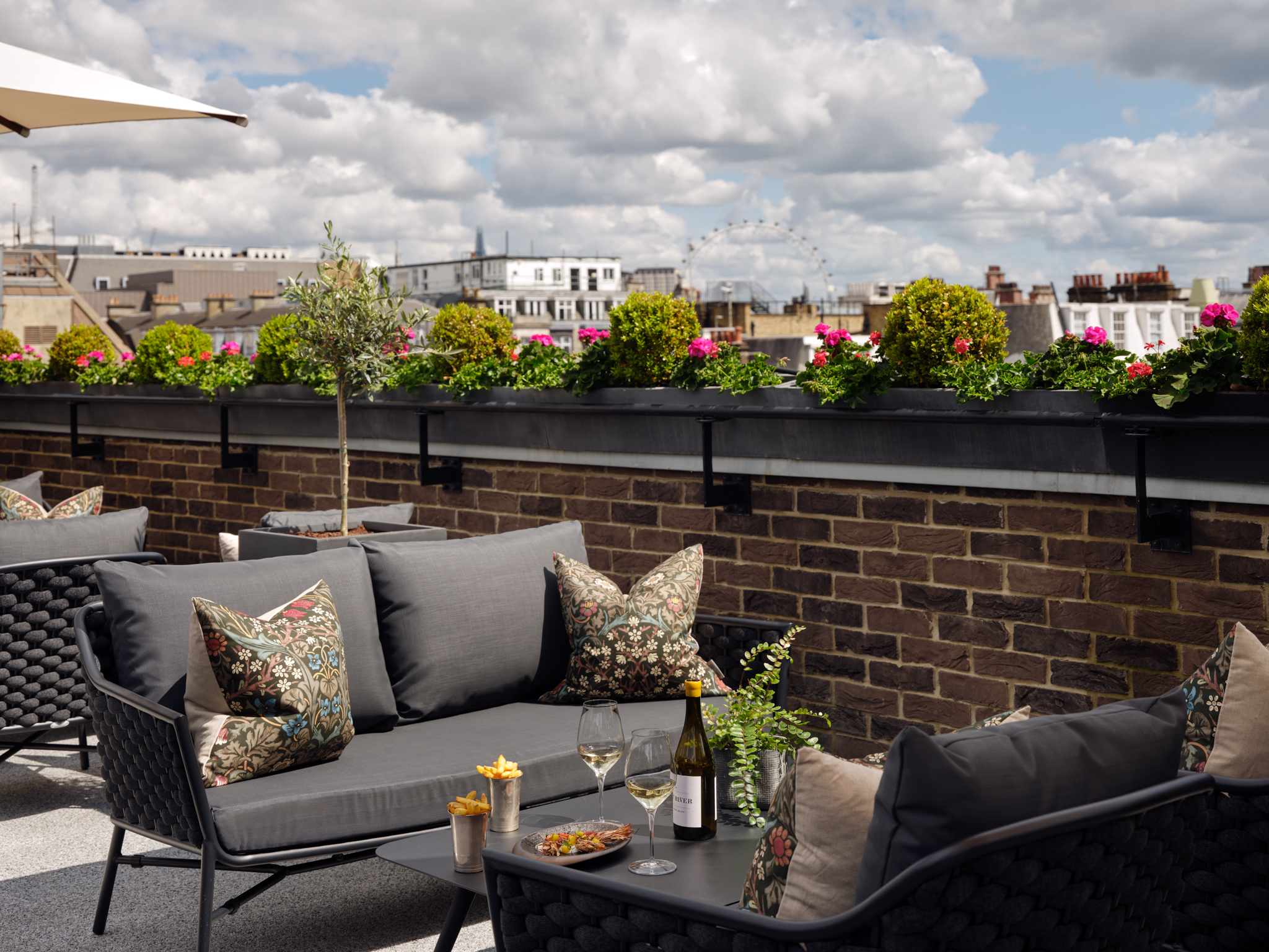 Stylish rooftop terrace at The Stafford London, perfect for intimate gatherings and events.