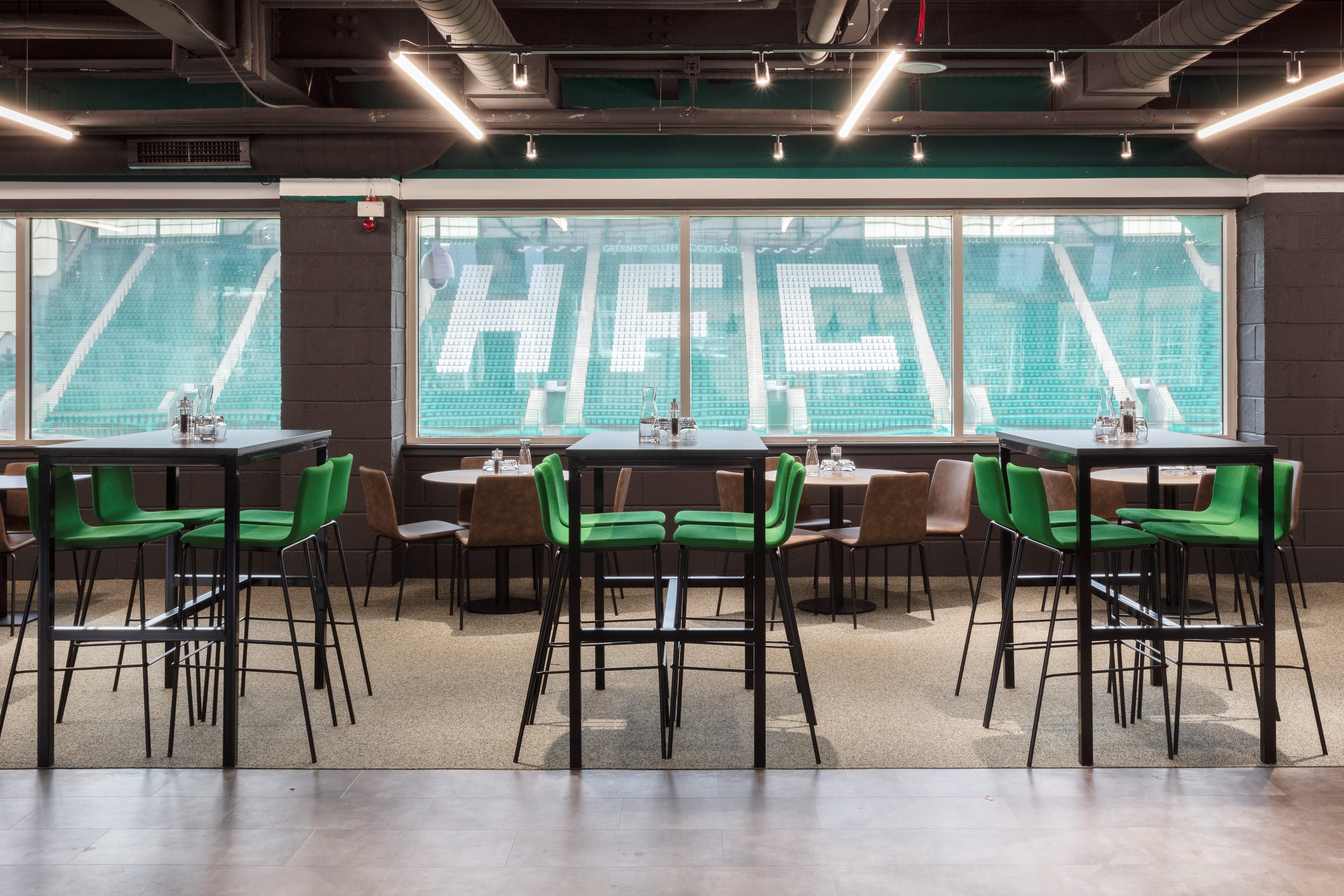 Edinburgh Club event space with green chairs, ideal for corporate gatherings and receptions.