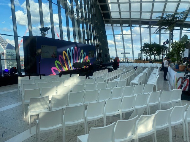 Exclusive Hire Sky Garden London event space with vibrant branding and seating.
