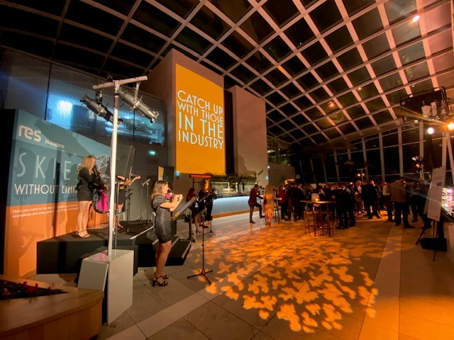 City Garden in Sky Garden London, vibrant networking event with stylish setup and live entertainment.