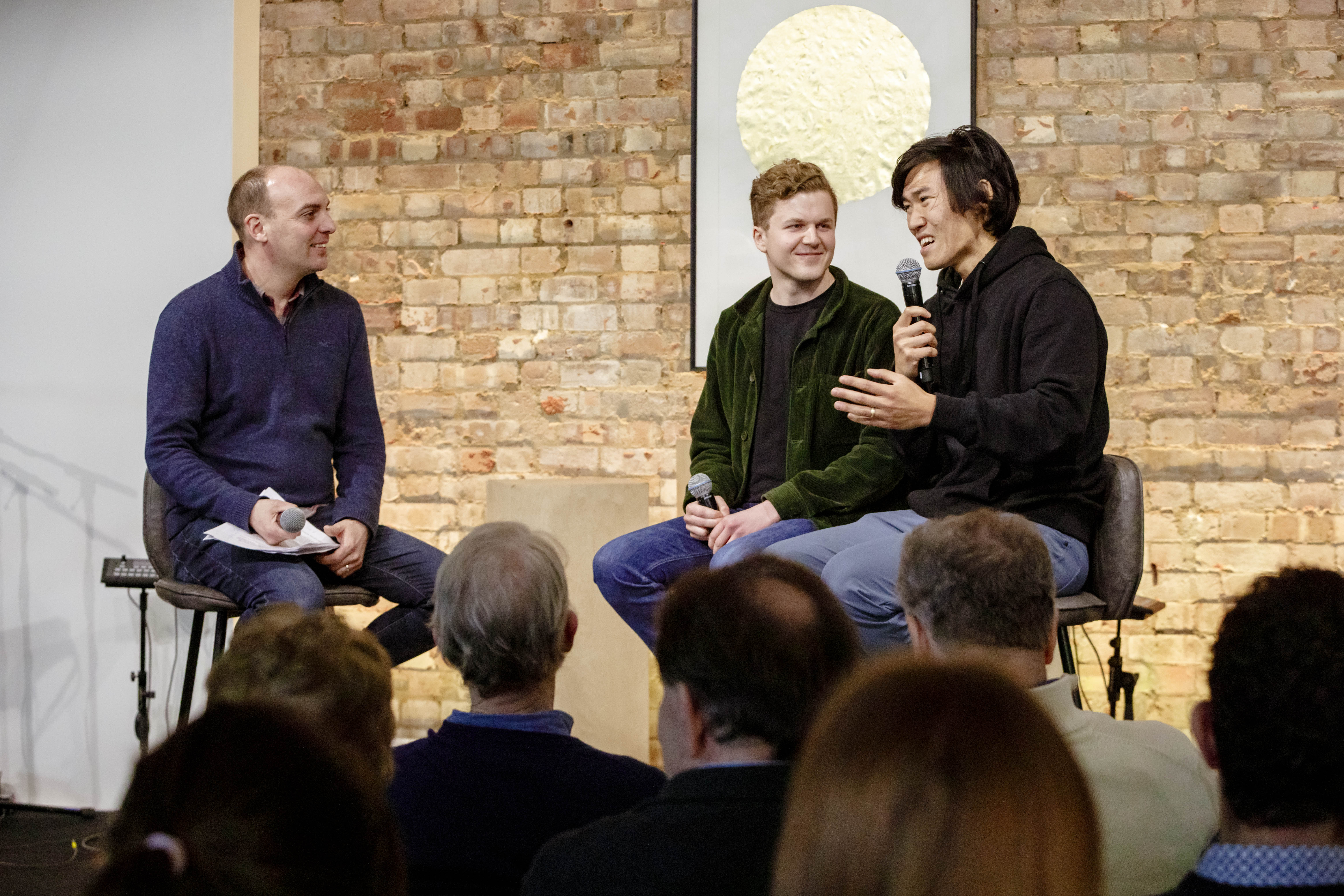 Panel discussion at Away Days conference in King's House, featuring engaged speakers and audience.
