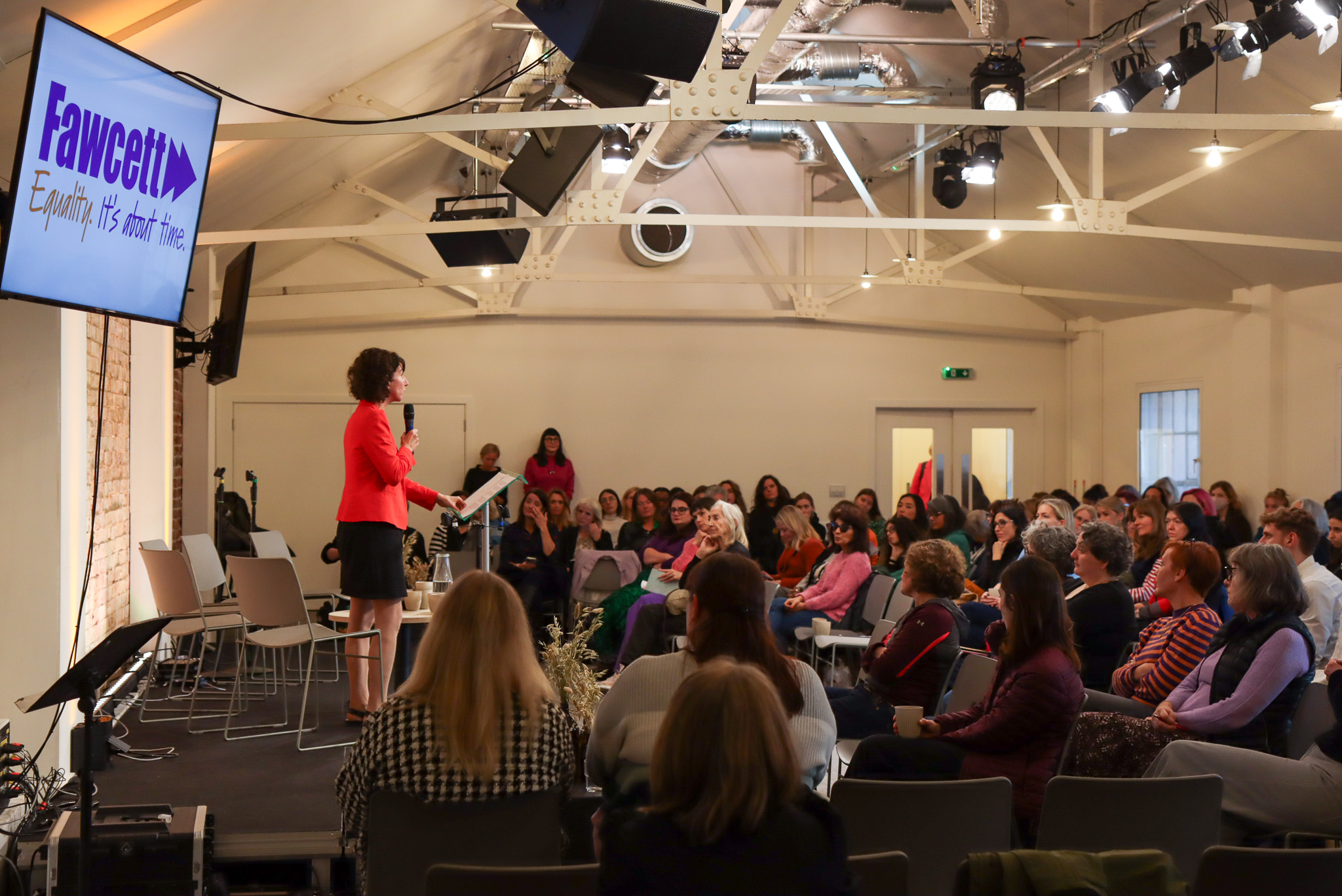 Away Days conference in King's House with speaker and modern seating for networking.