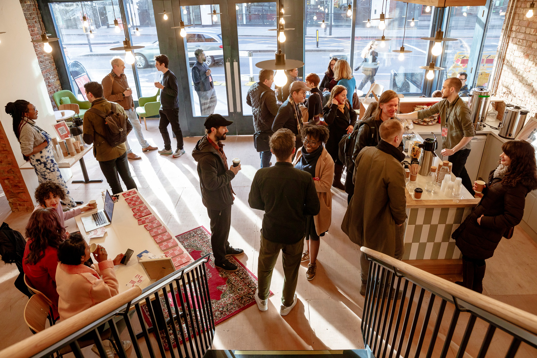 Hybrid event networking with live music in a modern venue, featuring vibrant interactions.