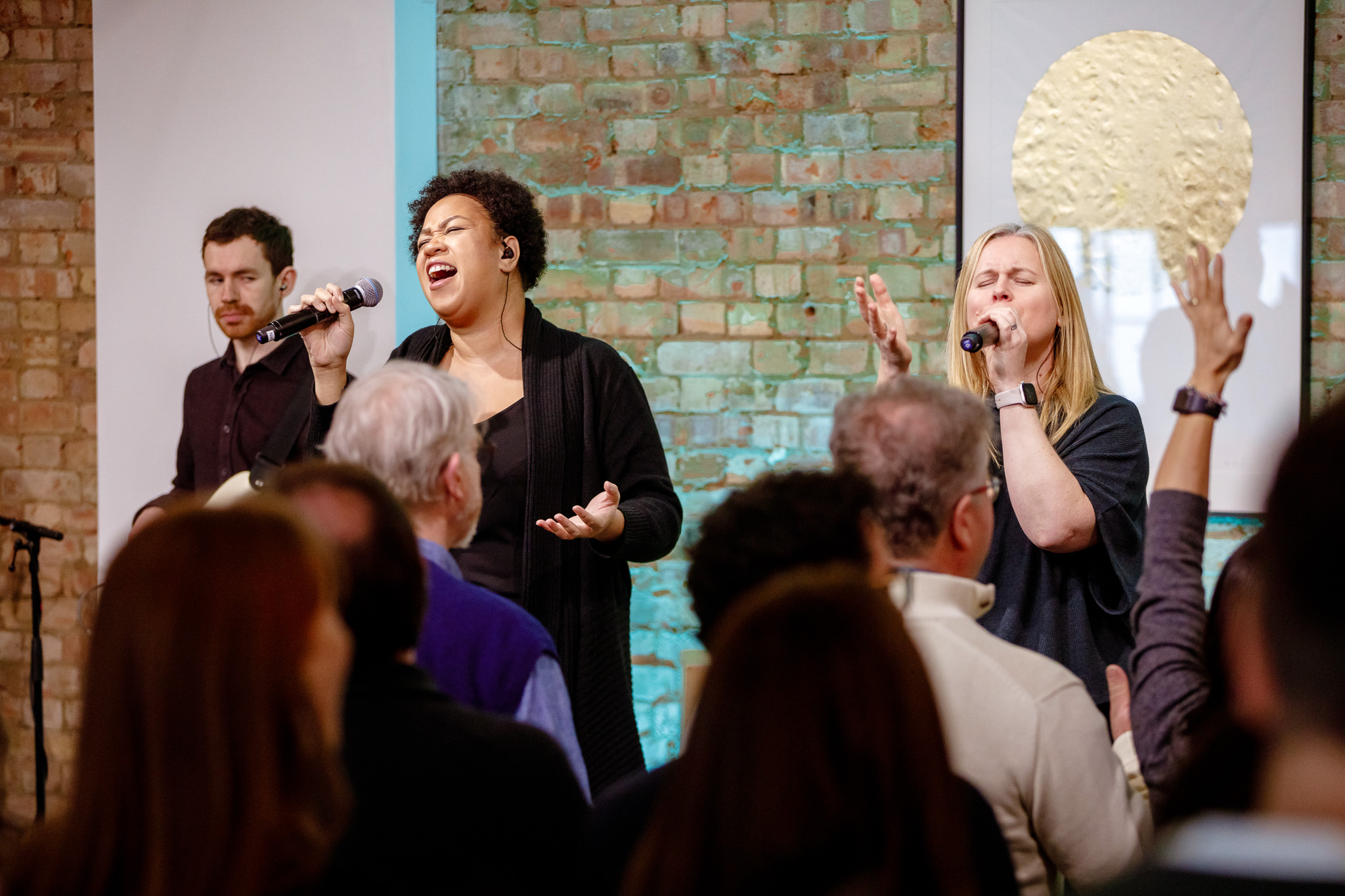 Live performance at King's House charity fundraiser networking event, vibrant atmosphere.