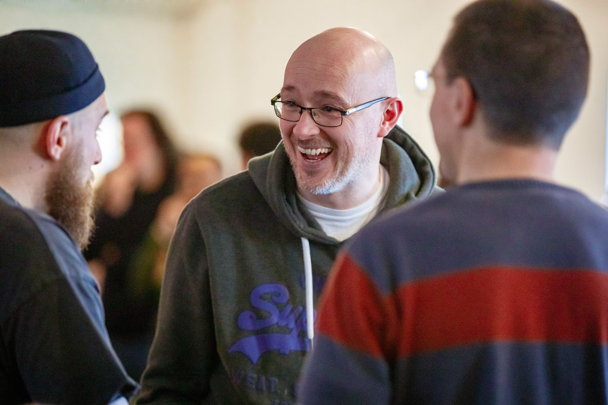 Lively workshop networking at King's House, fostering collaboration and creativity.