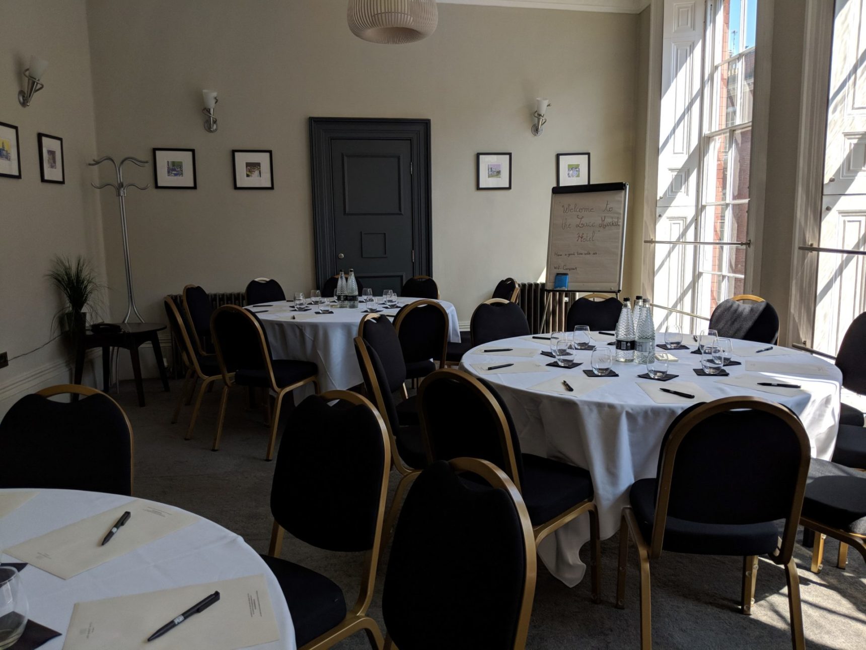 Event Space in Lace Market Hotel with round tables, perfect for workshops and meetings.