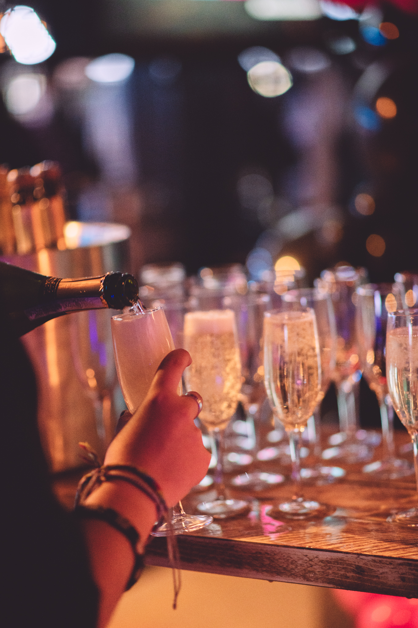 Champagne toast setup at Boom Battle Bar for weddings and corporate events.