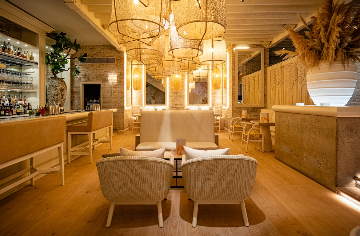 Stylish venue with warm lighting for intimate gatherings and networking events.