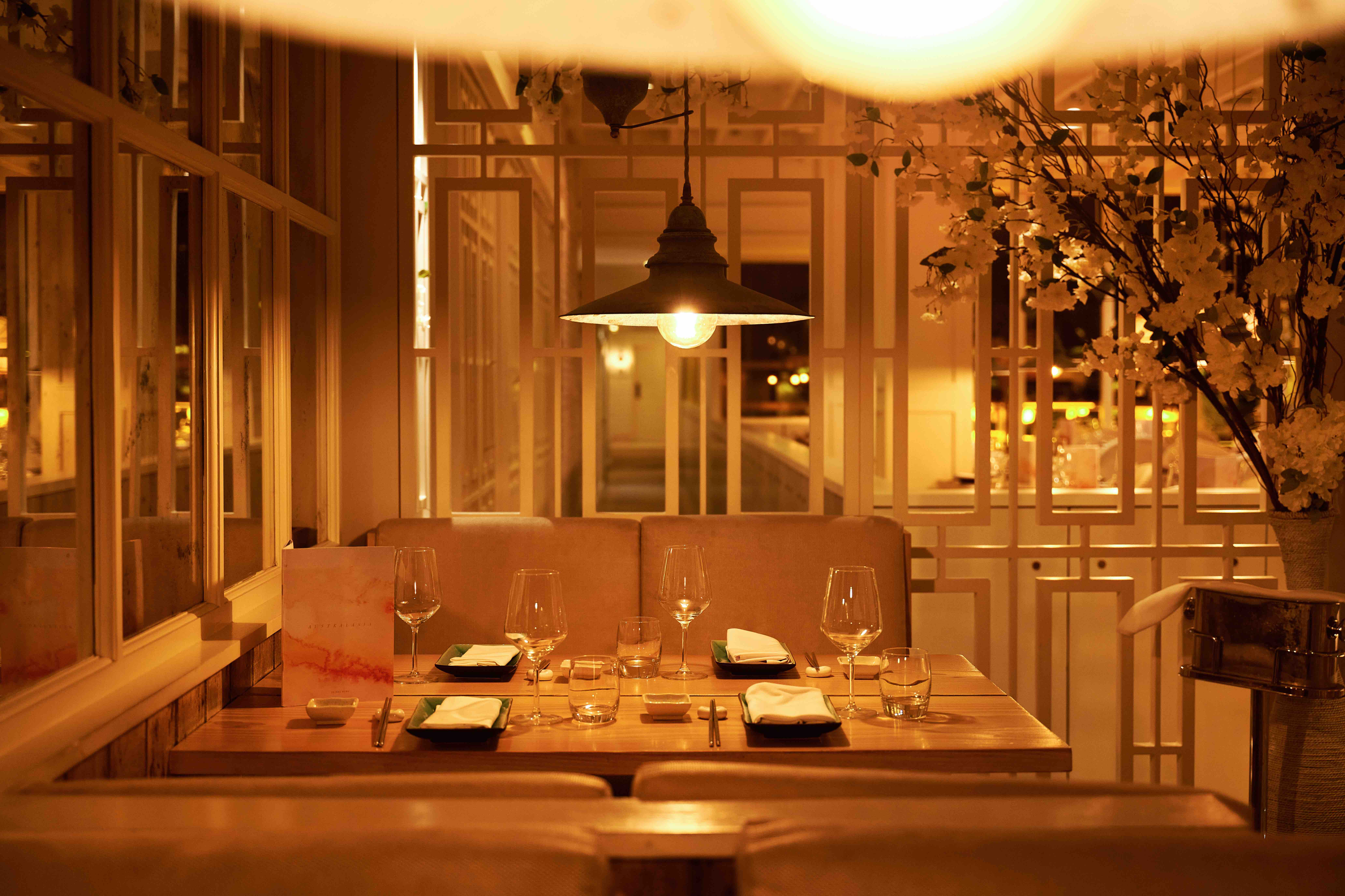 Elegant restaurant setting with warm lighting for intimate gatherings and upscale events.