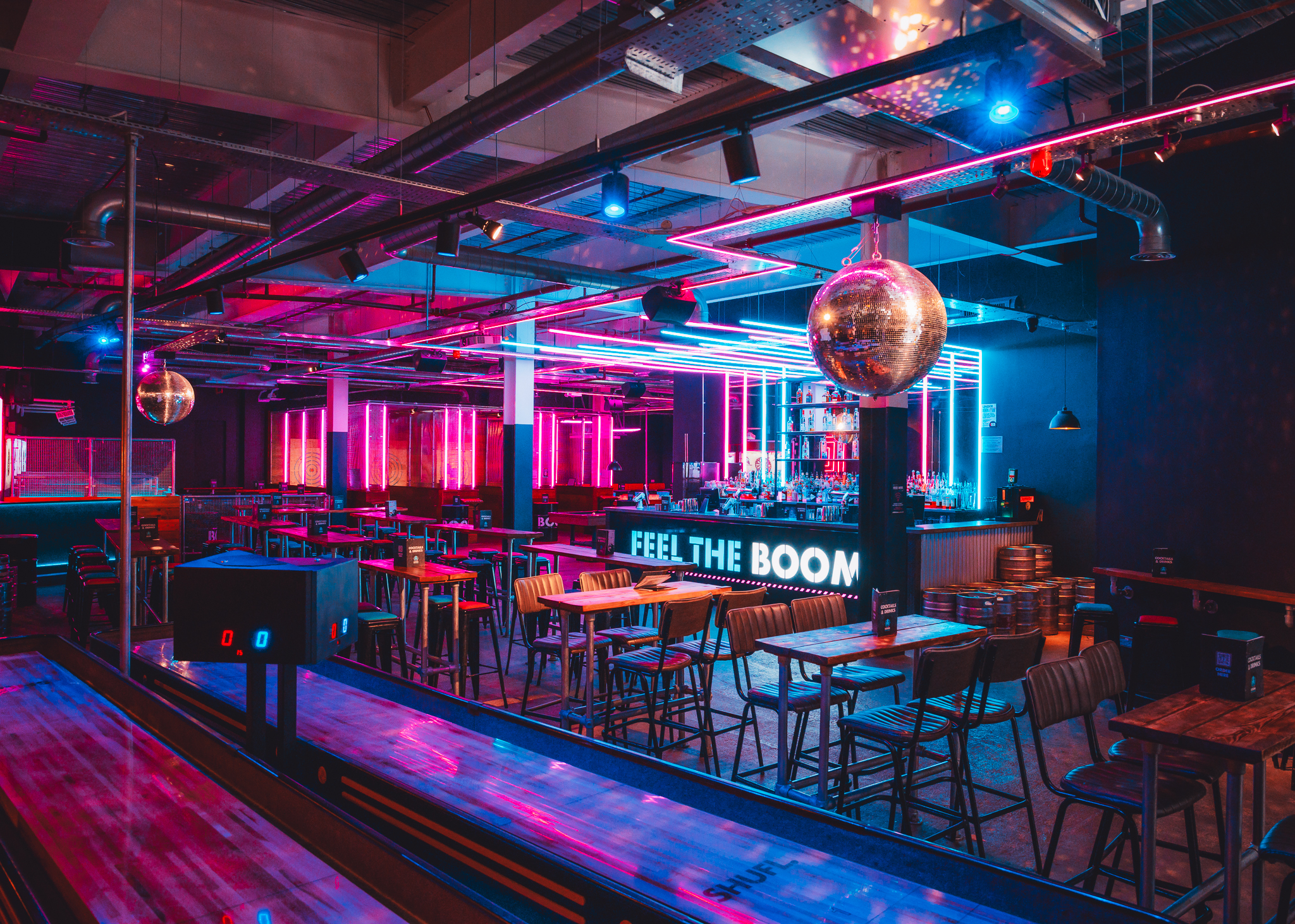 Vibrant event space with disco ball for private hire in Boom Battle Bar Leeds.