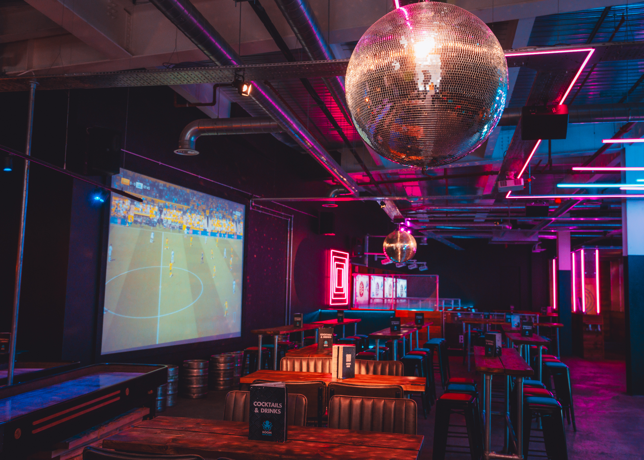 Party Packages at Boom Battle Bar Leeds with vibrant decor for corporate events and gatherings.
