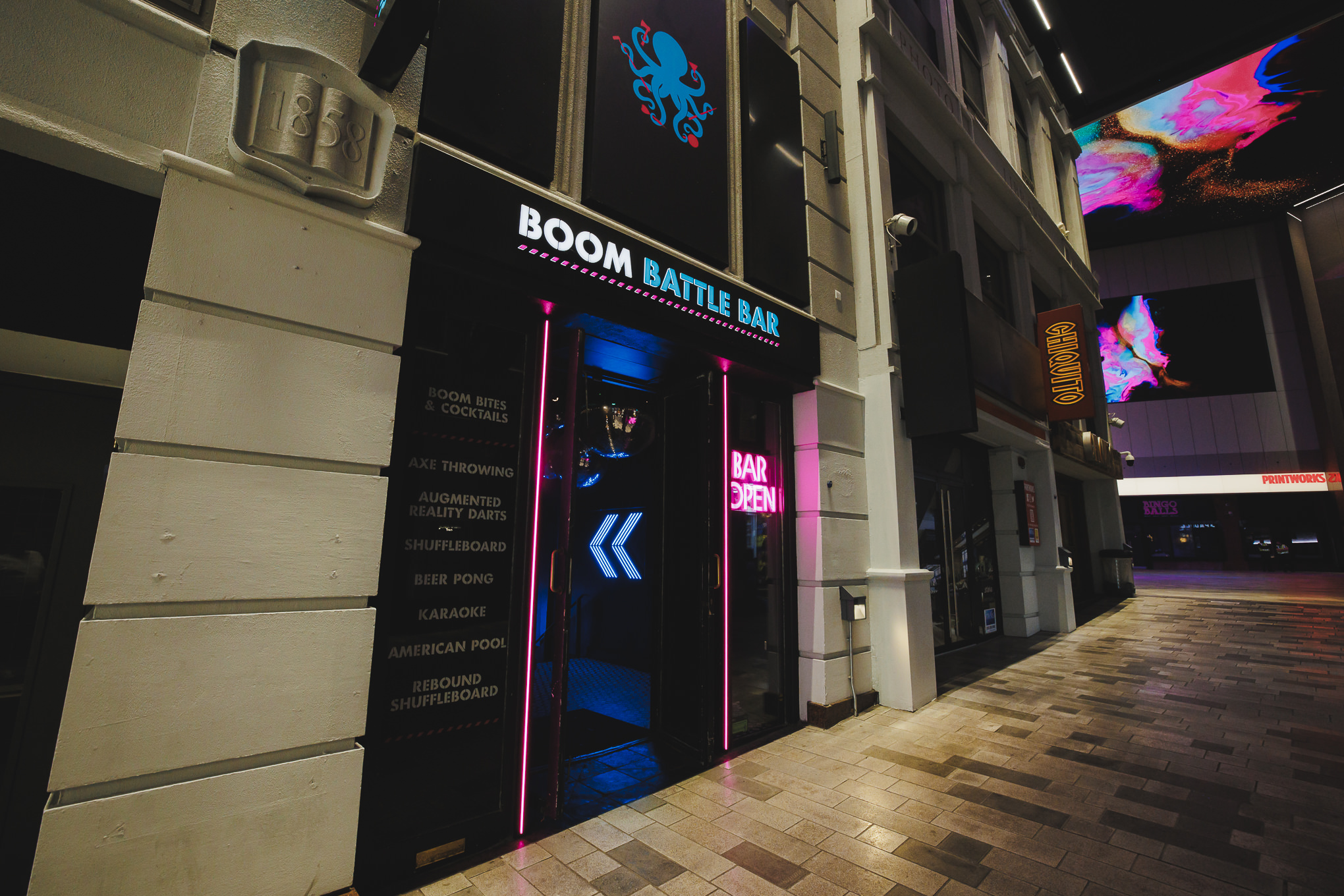 Vibrant entrance of Boom Battle Bar Manchester for dynamic team-building events.