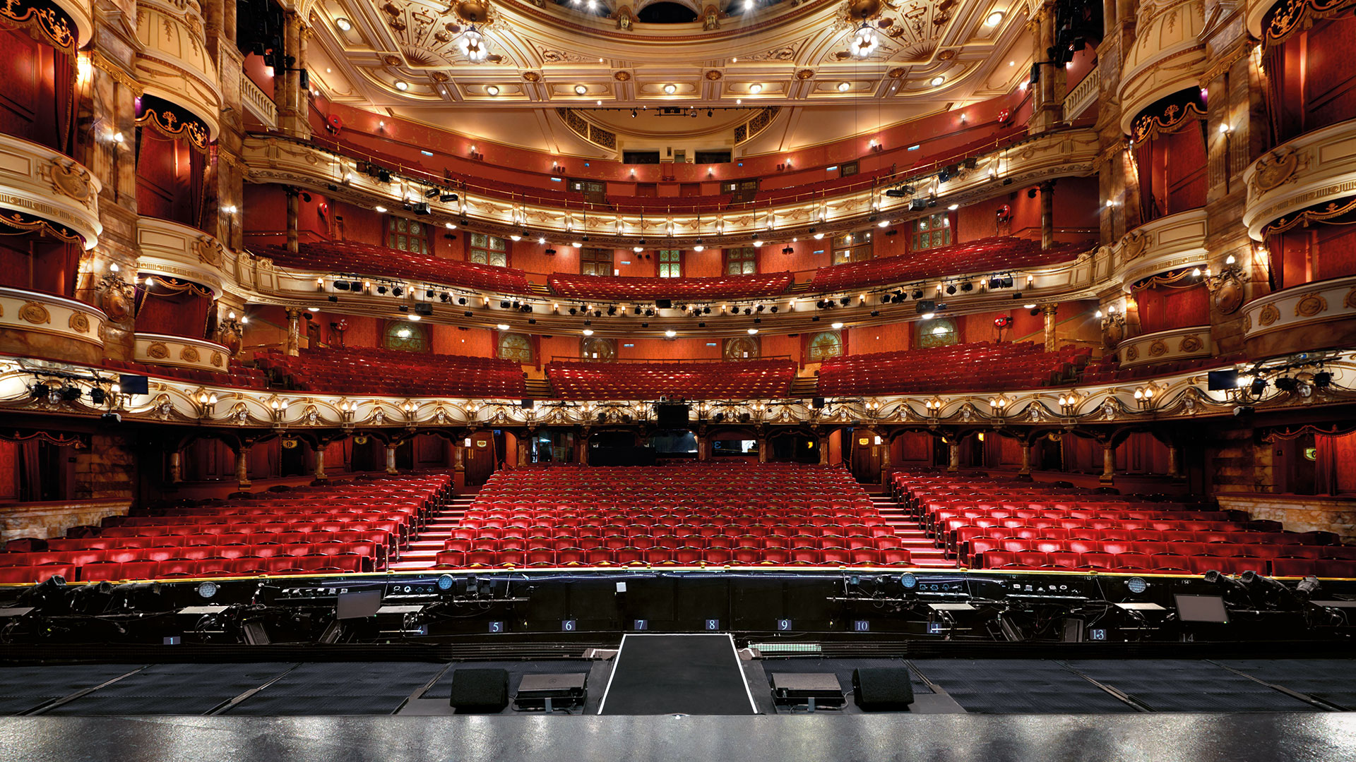 London Coliseum stage with ornate decor, perfect for performances and events.