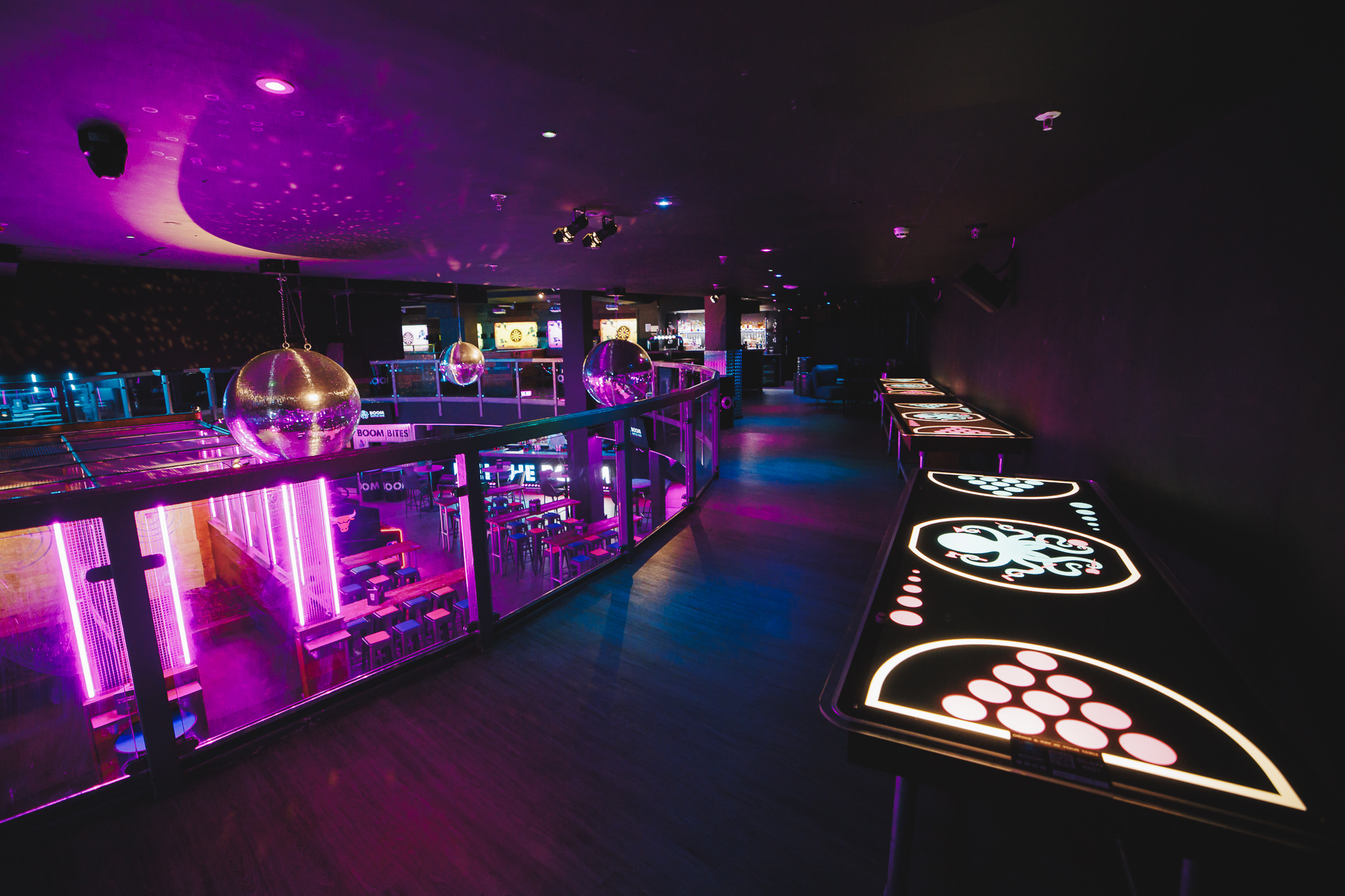 "Vibrant event space in Boom Battle Bar Manchester for private hire, ideal for gatherings."