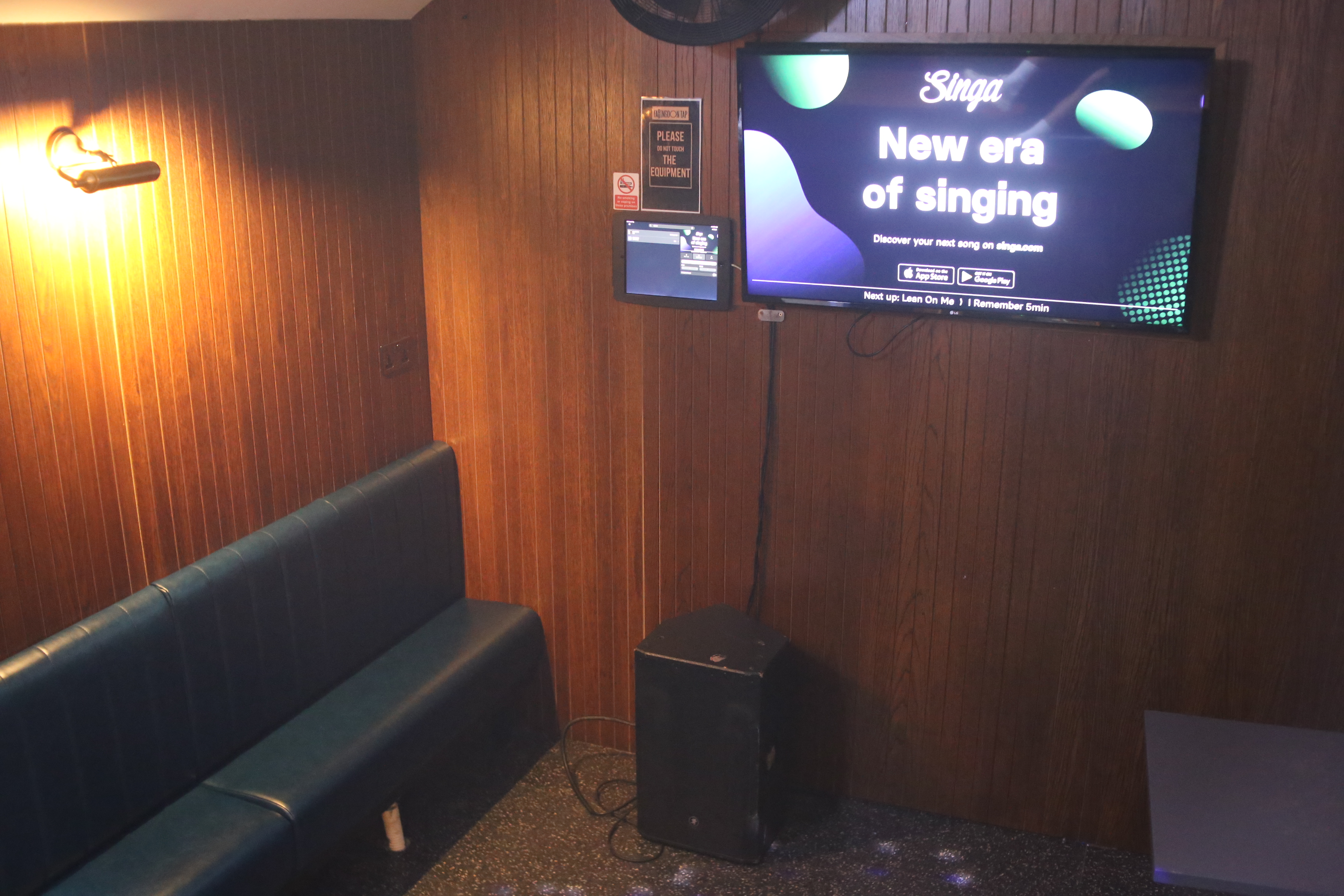 Cozy karaoke room in Farringdon Tap for team-building events and celebrations.