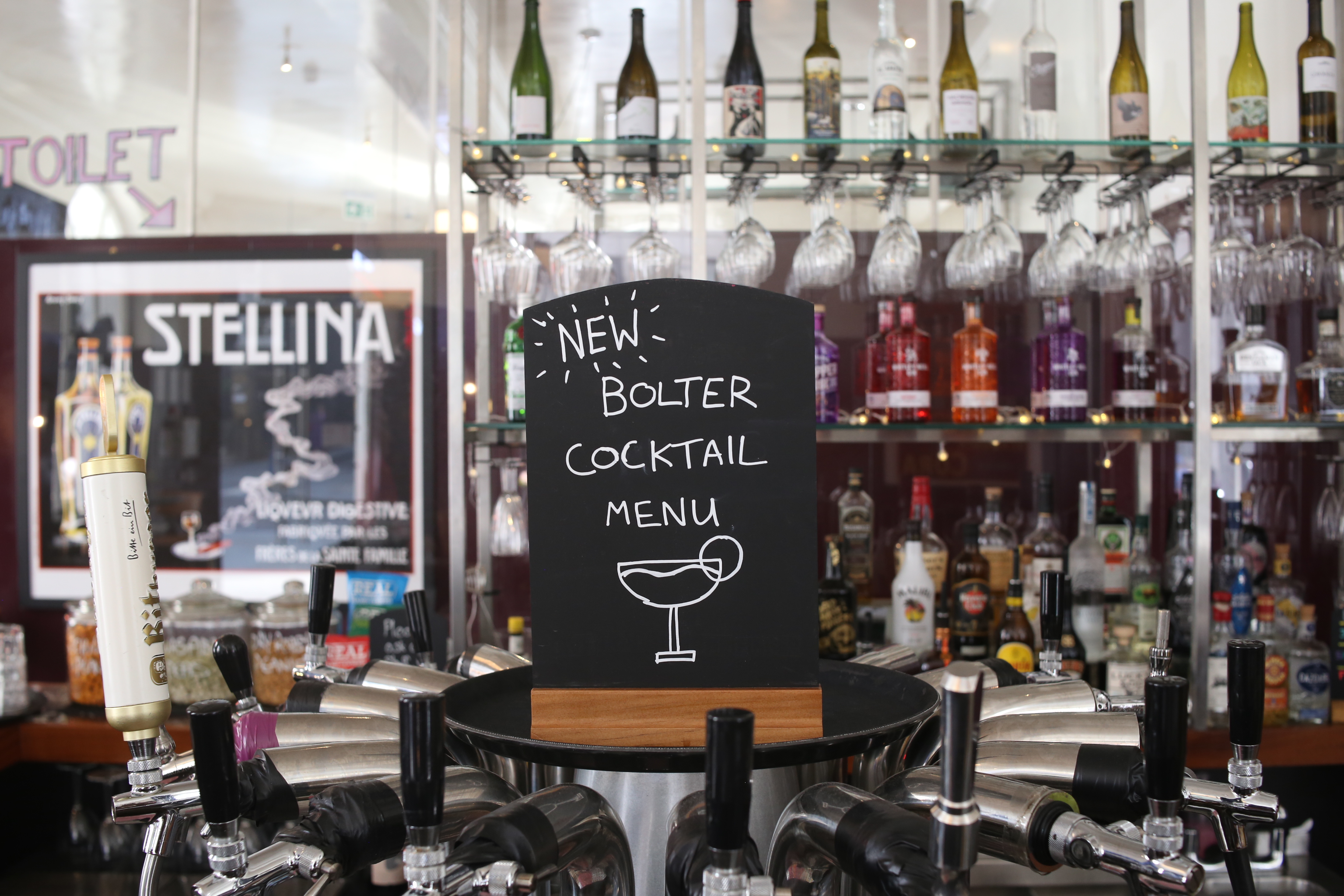 "Whole Venue bar with unique cocktail menu for memorable events and social gatherings."